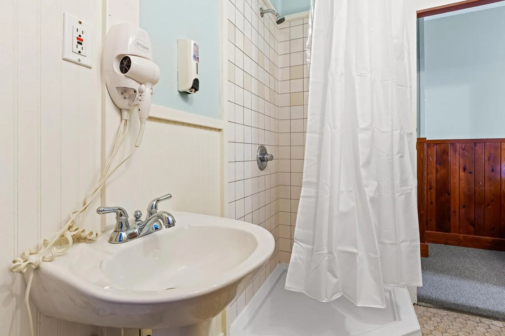 Shower in Nags Head Beach Inn by KEES Vacations