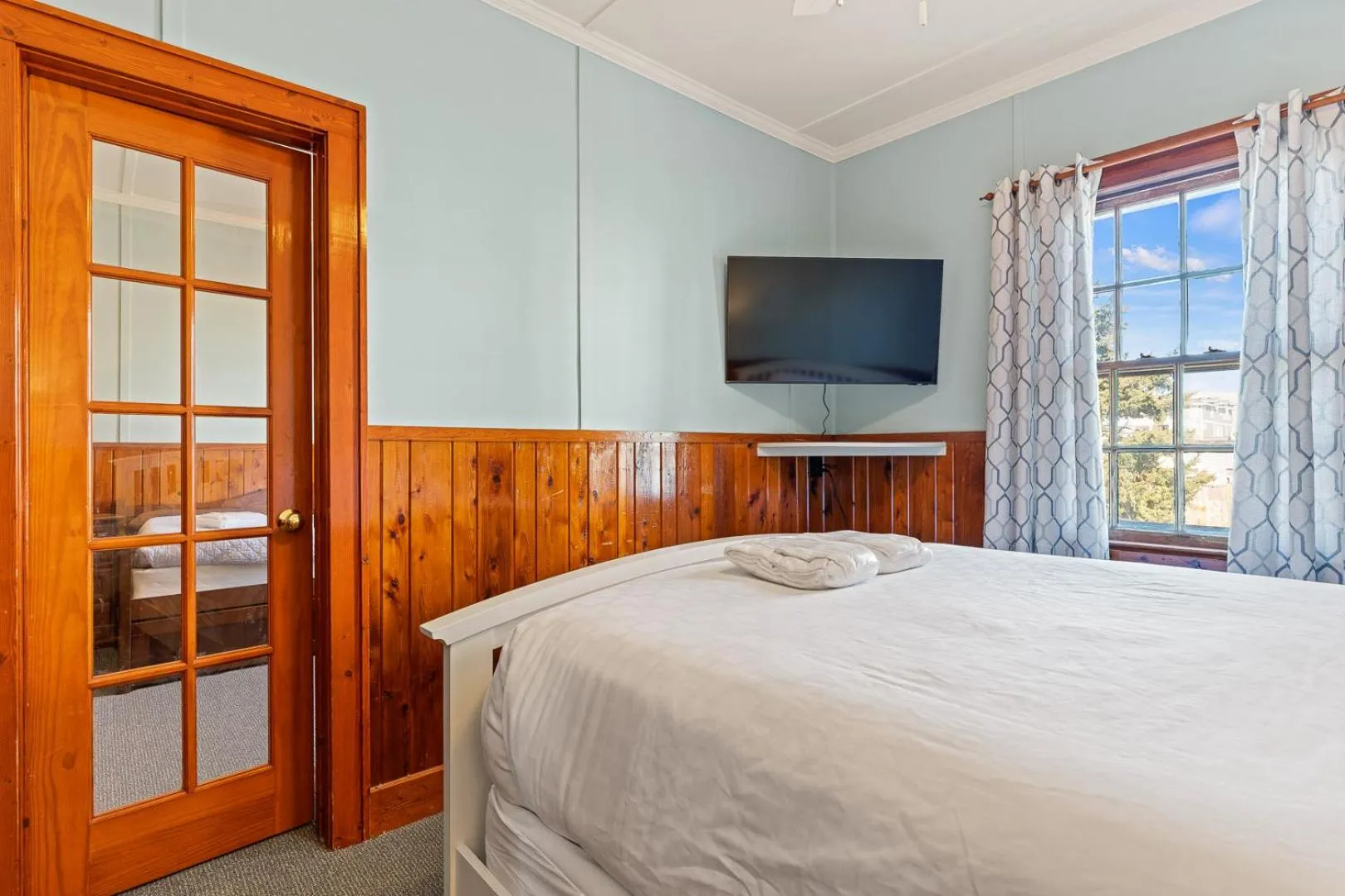 Bedroom, Bed in Nags Head Beach Inn by KEES Vacations