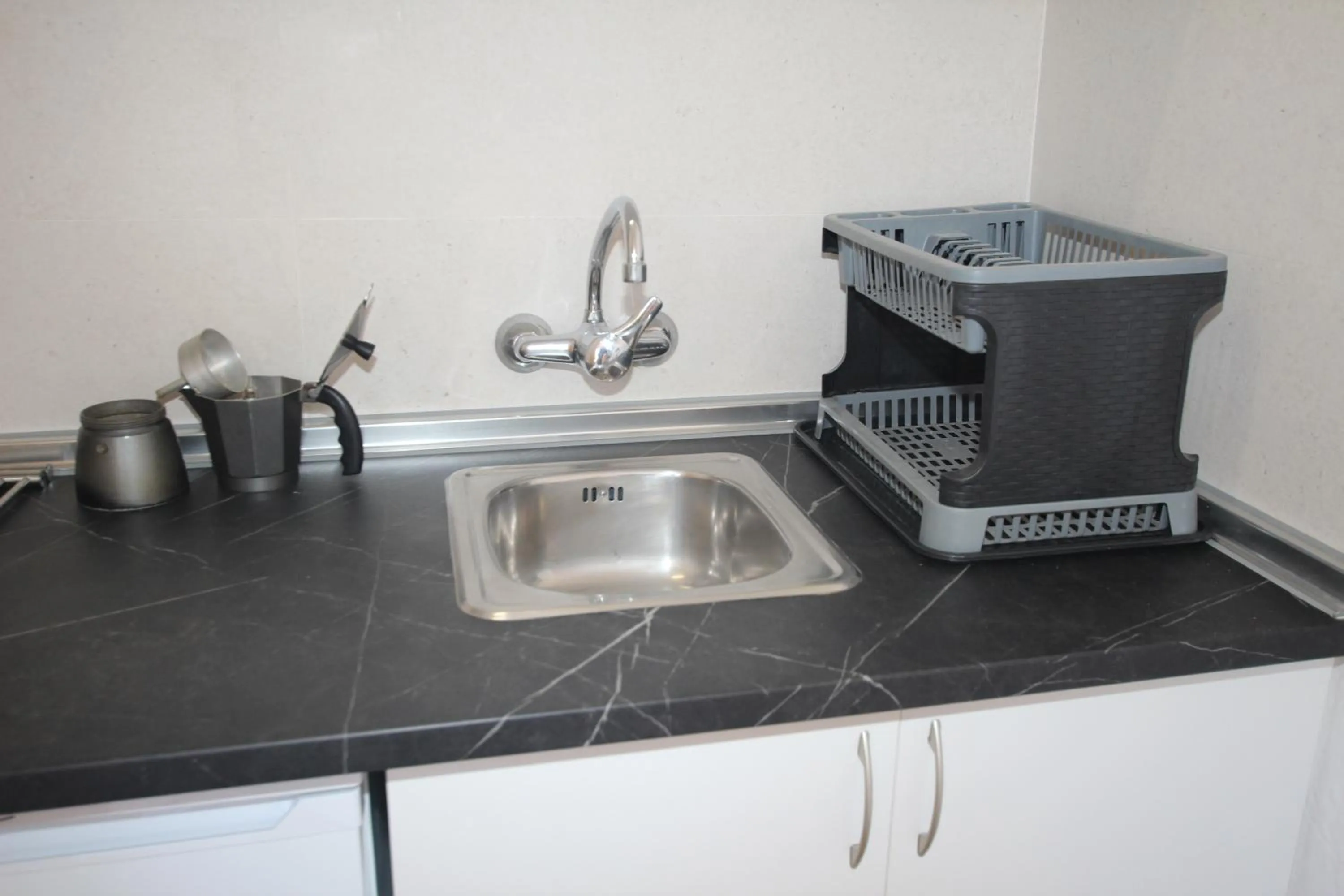 Kitchen or kitchenette in Apartamentos El Sol II