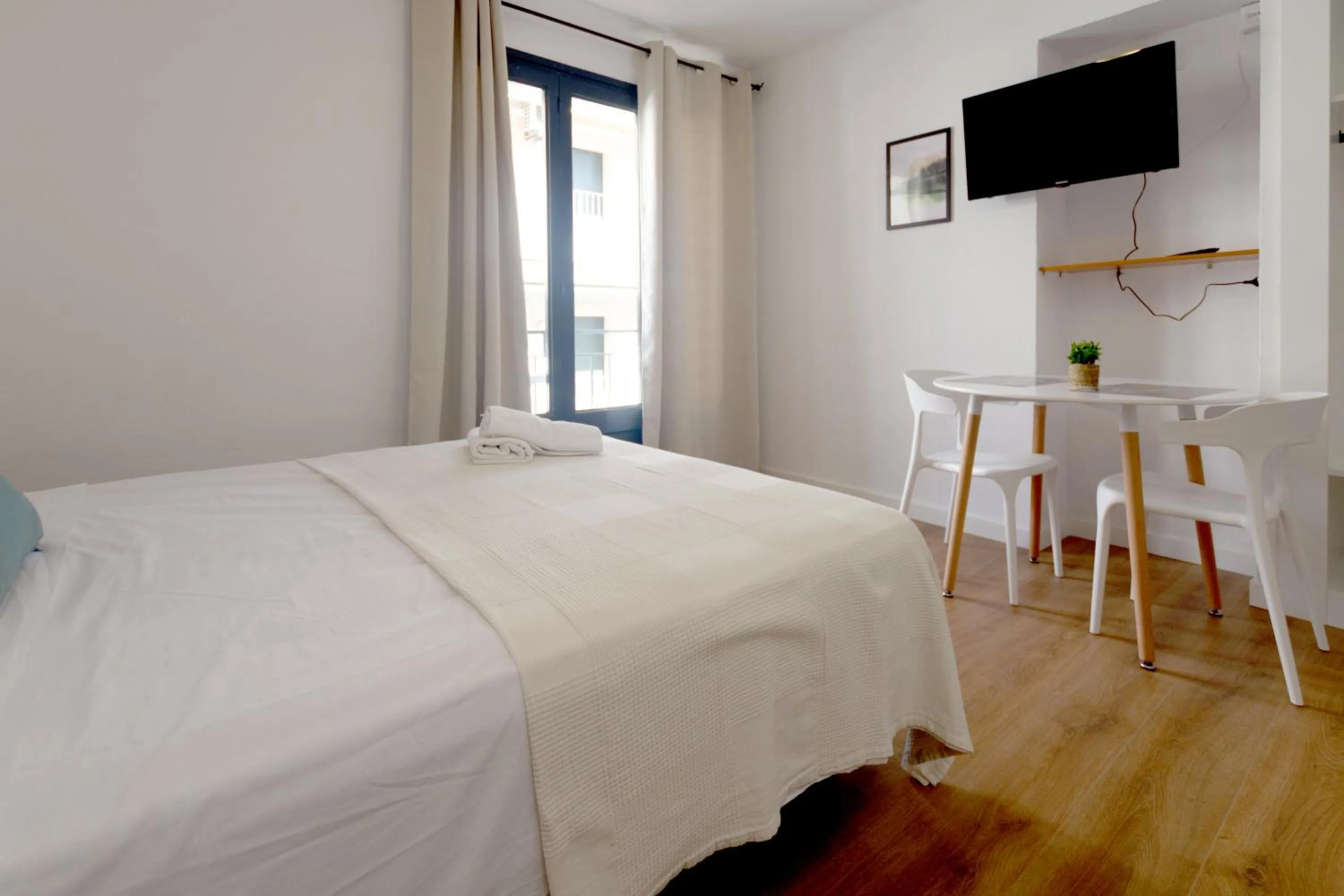 Bed in Apartamentos El Sol II