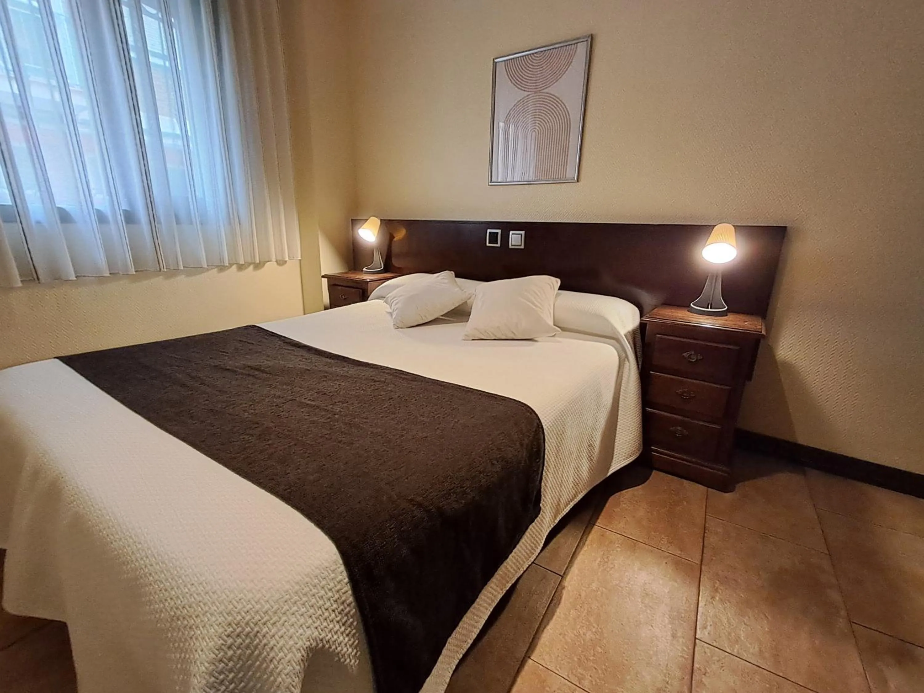 Bed in Hotel Complutense