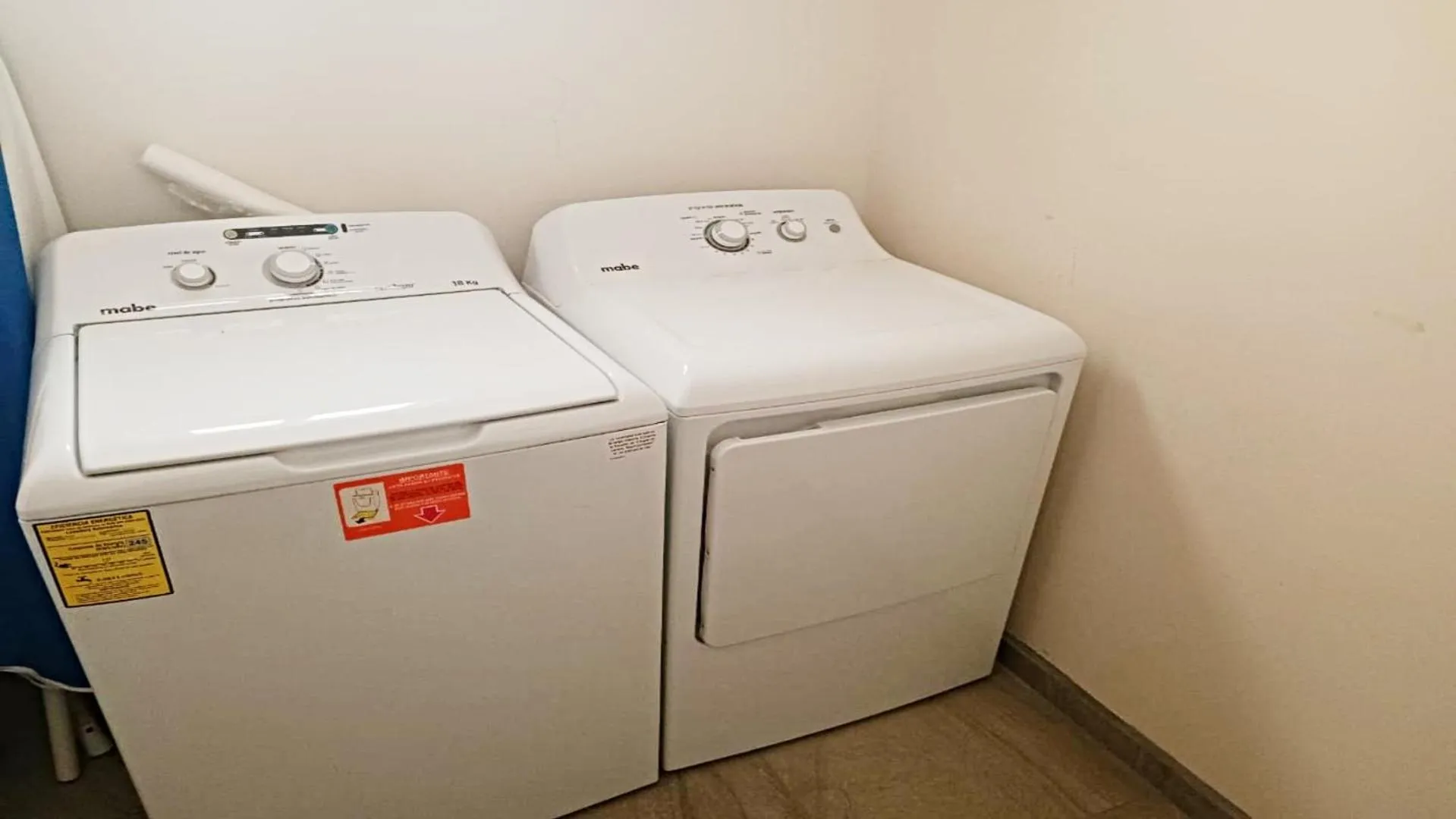 washing machine in Moon House F4: Spacious 3-Bedroom Apartment in Downtown