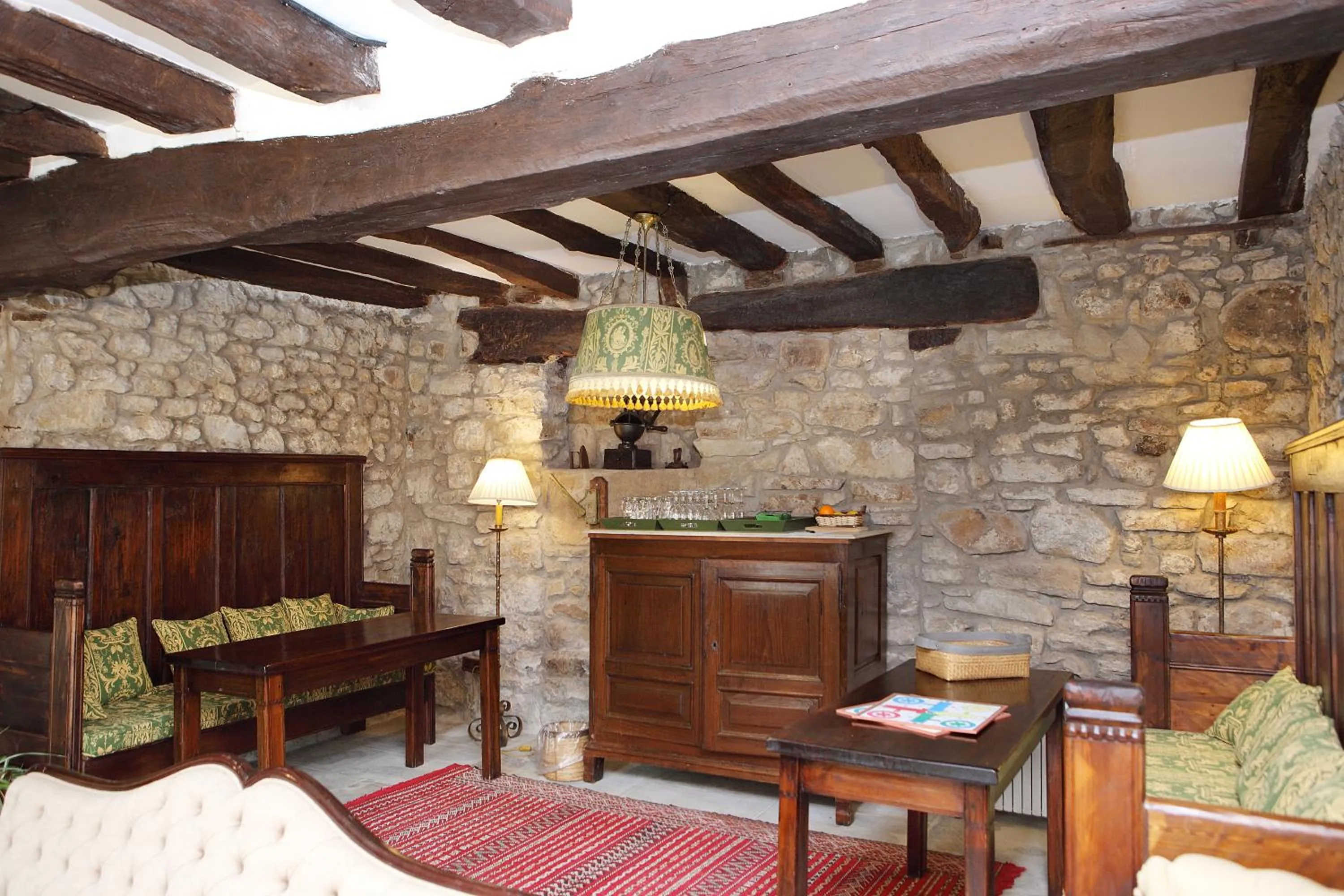 Communal lounge/ TV room in Posada La Torre de La Quintana