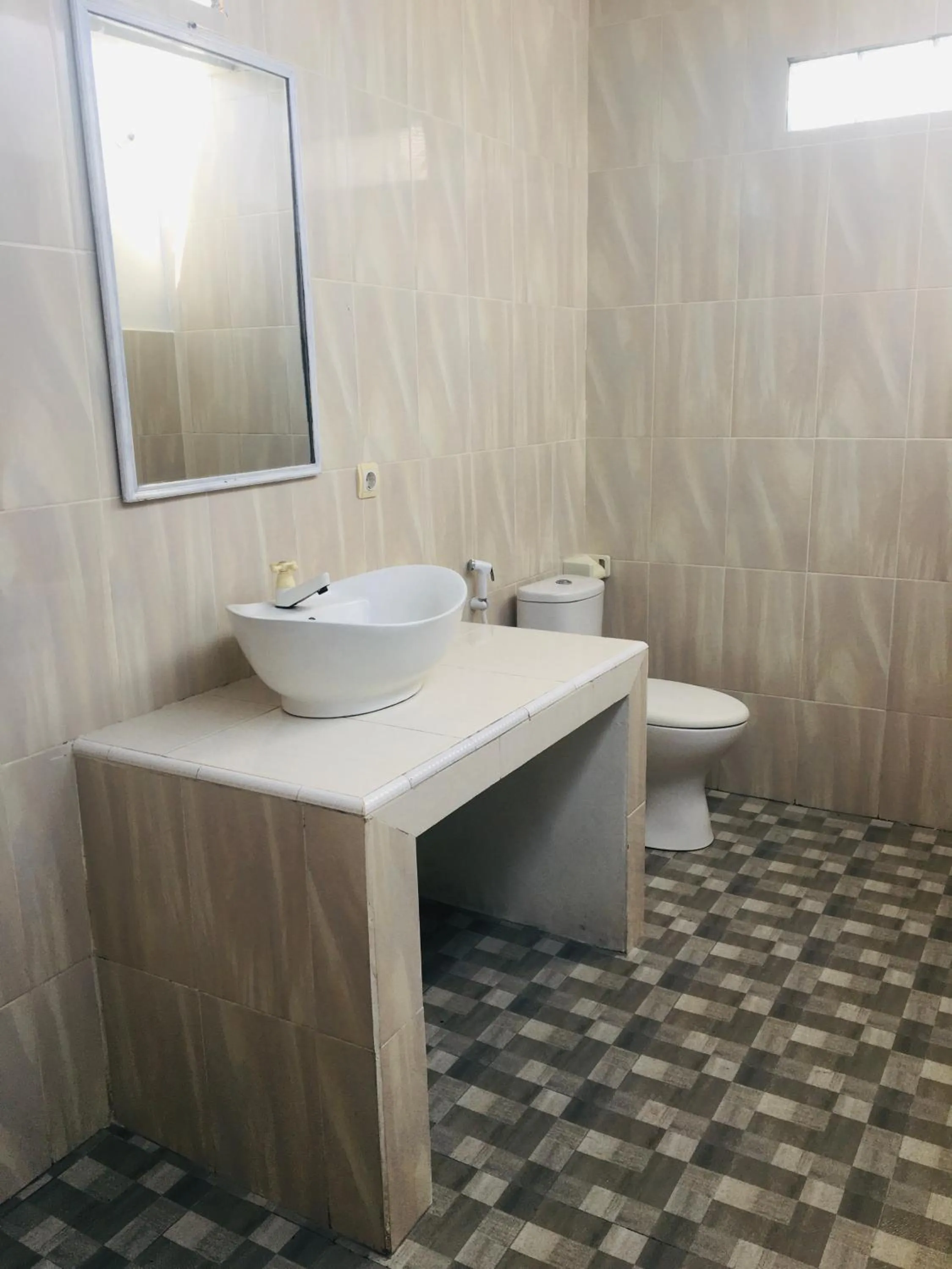 Toilet in Puring Bungalows