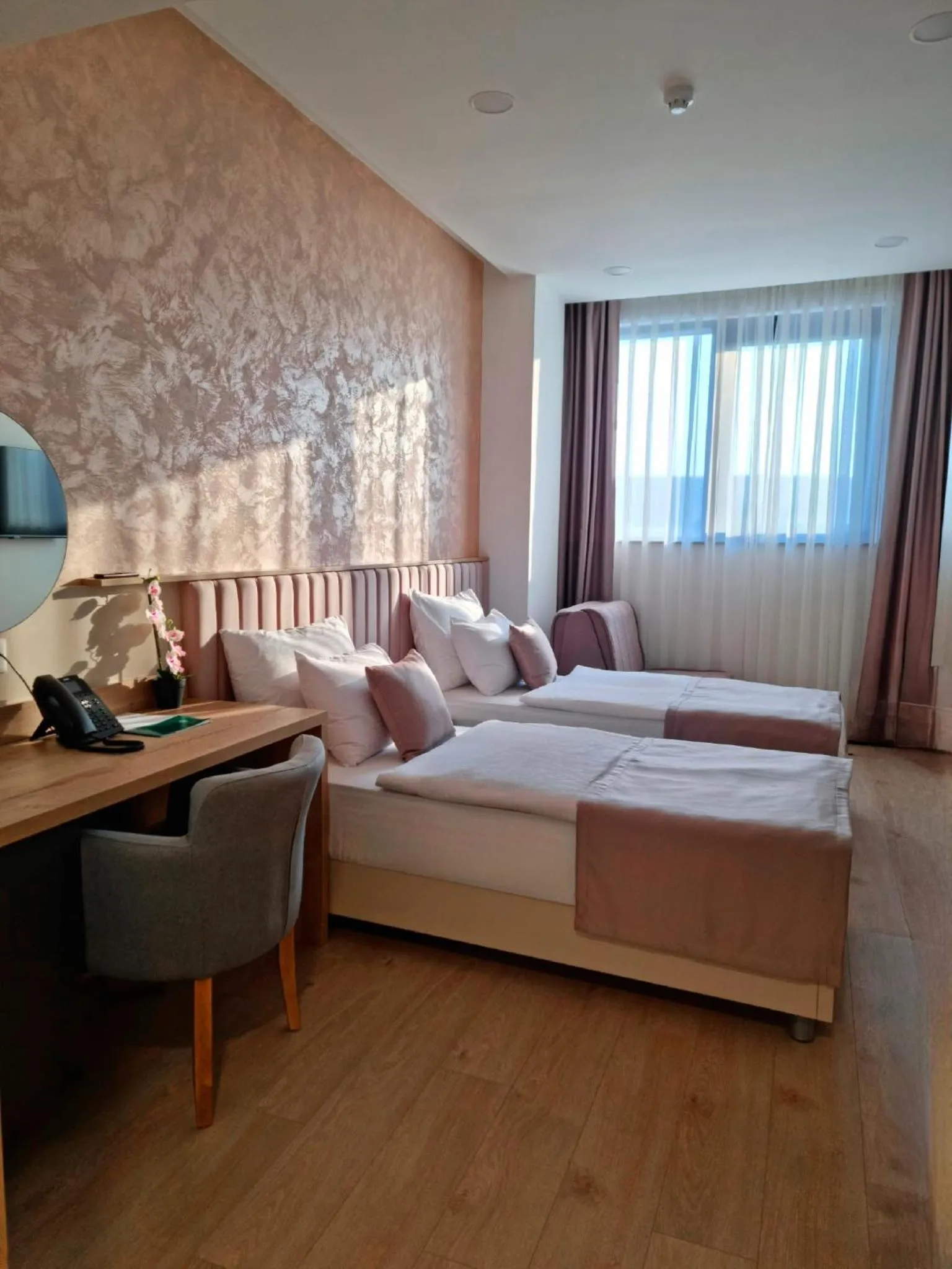 Bed in Hotel Emerald