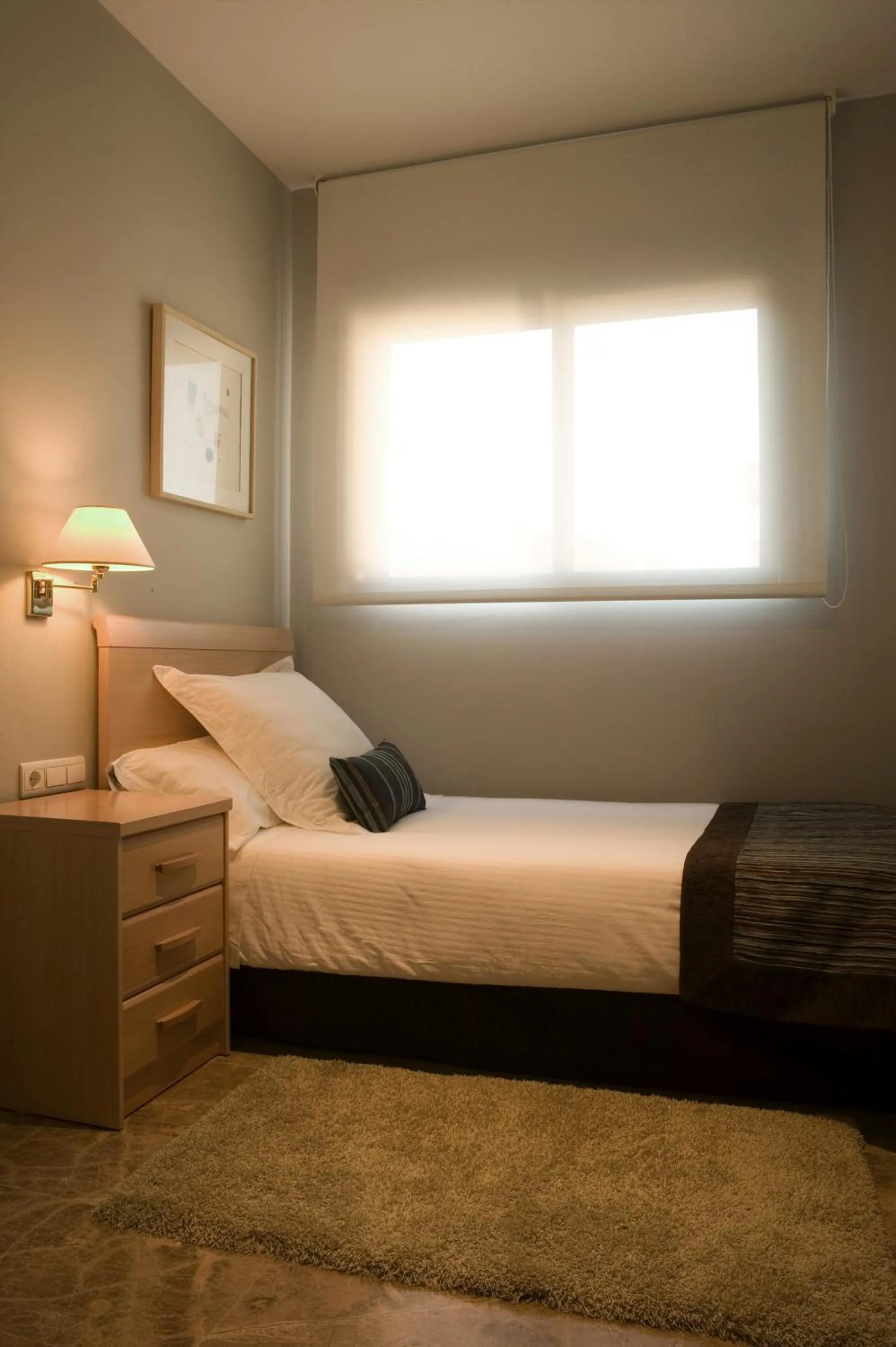 Bed in Apartamentos Plaza Picasso