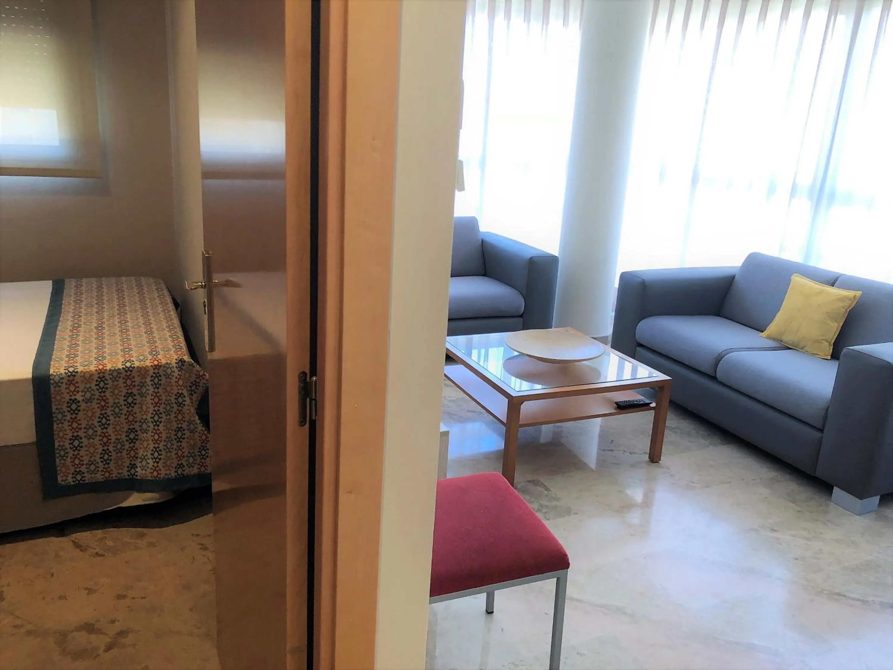 Living room, Bed in Apartamentos Plaza Picasso