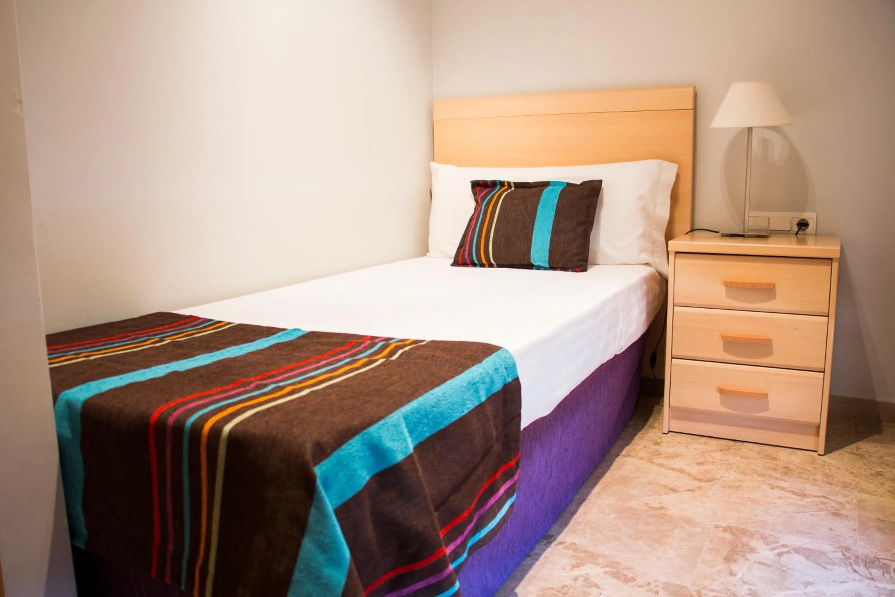 Bed in Apartamentos Plaza Picasso