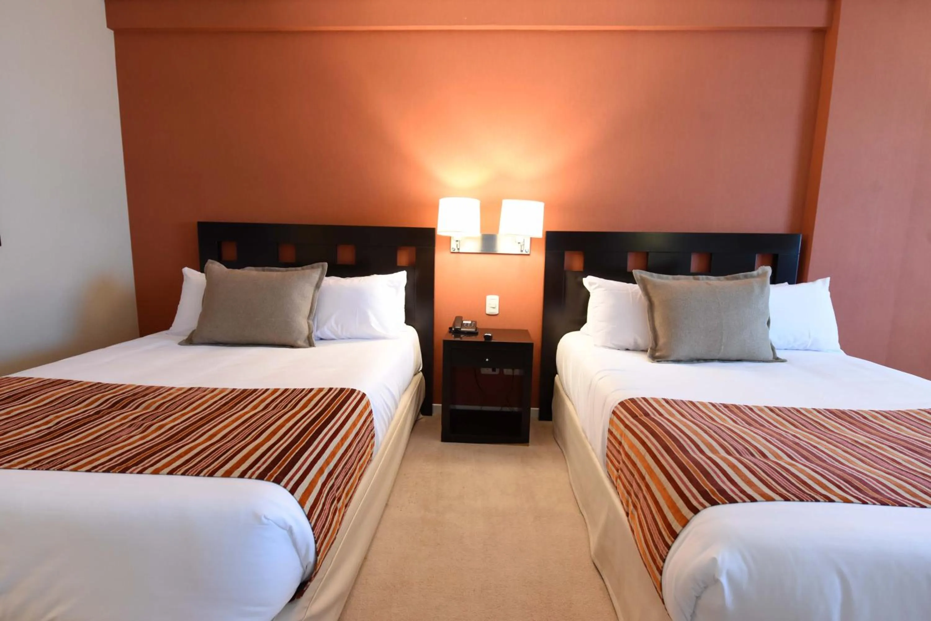 Bed in Camberland Resort & Spa Ramallo