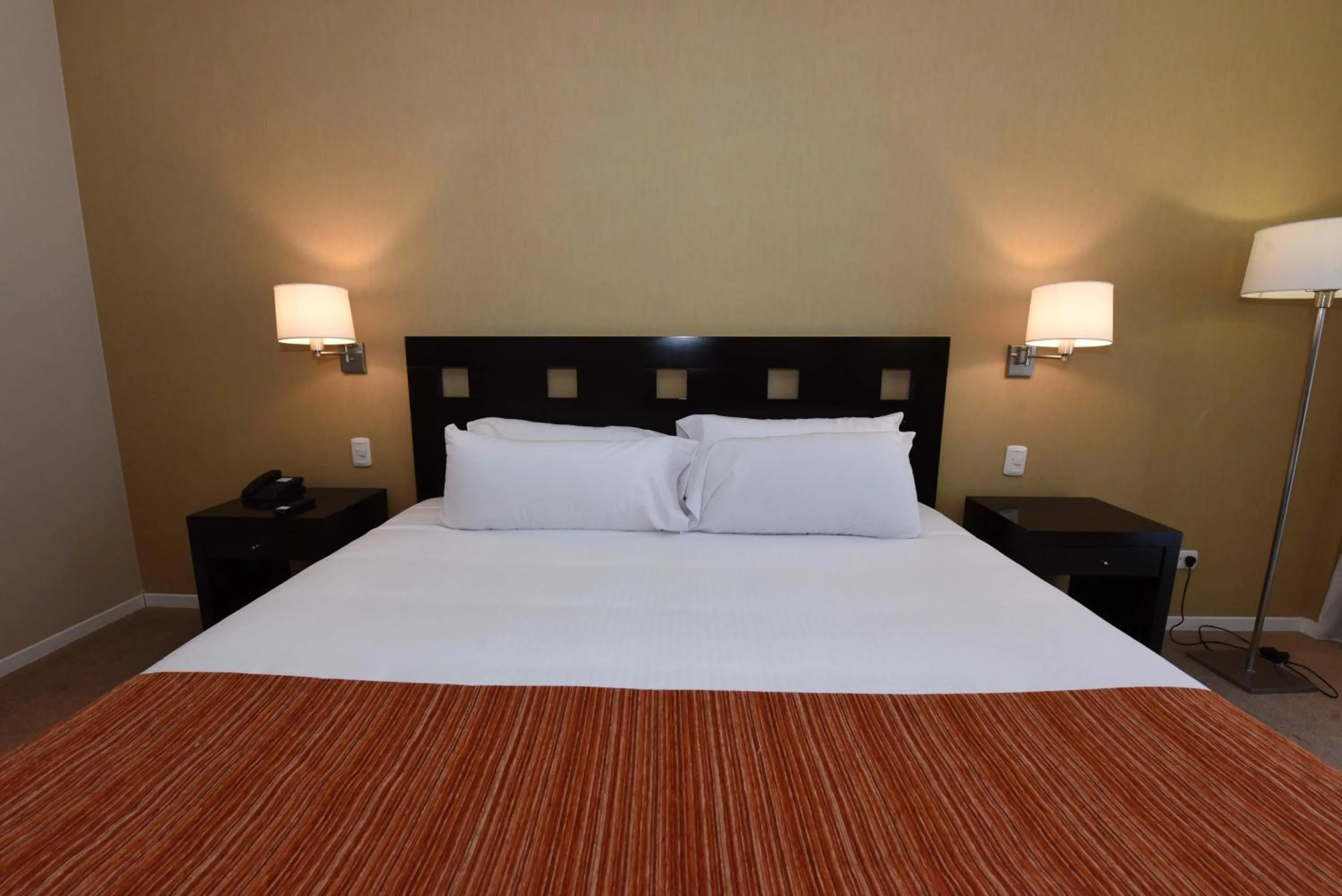 Bed in Camberland Resort & Spa Ramallo