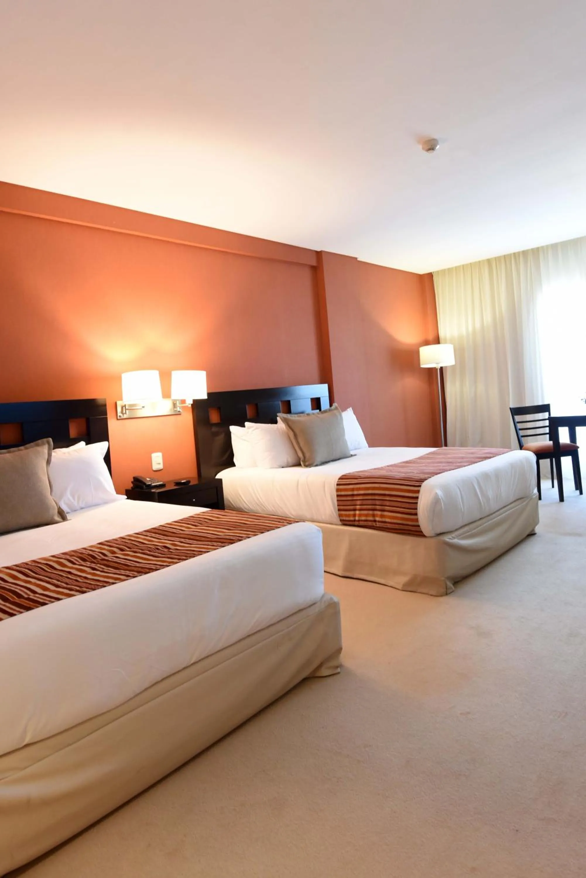 Bed in Camberland Resort & Spa Ramallo