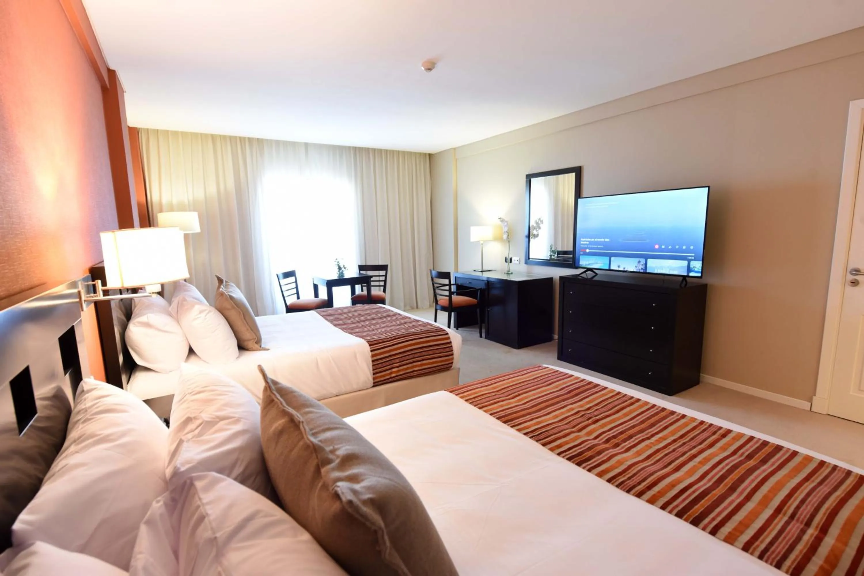 Photo of the whole room, Bed in Camberland Resort & Spa Ramallo