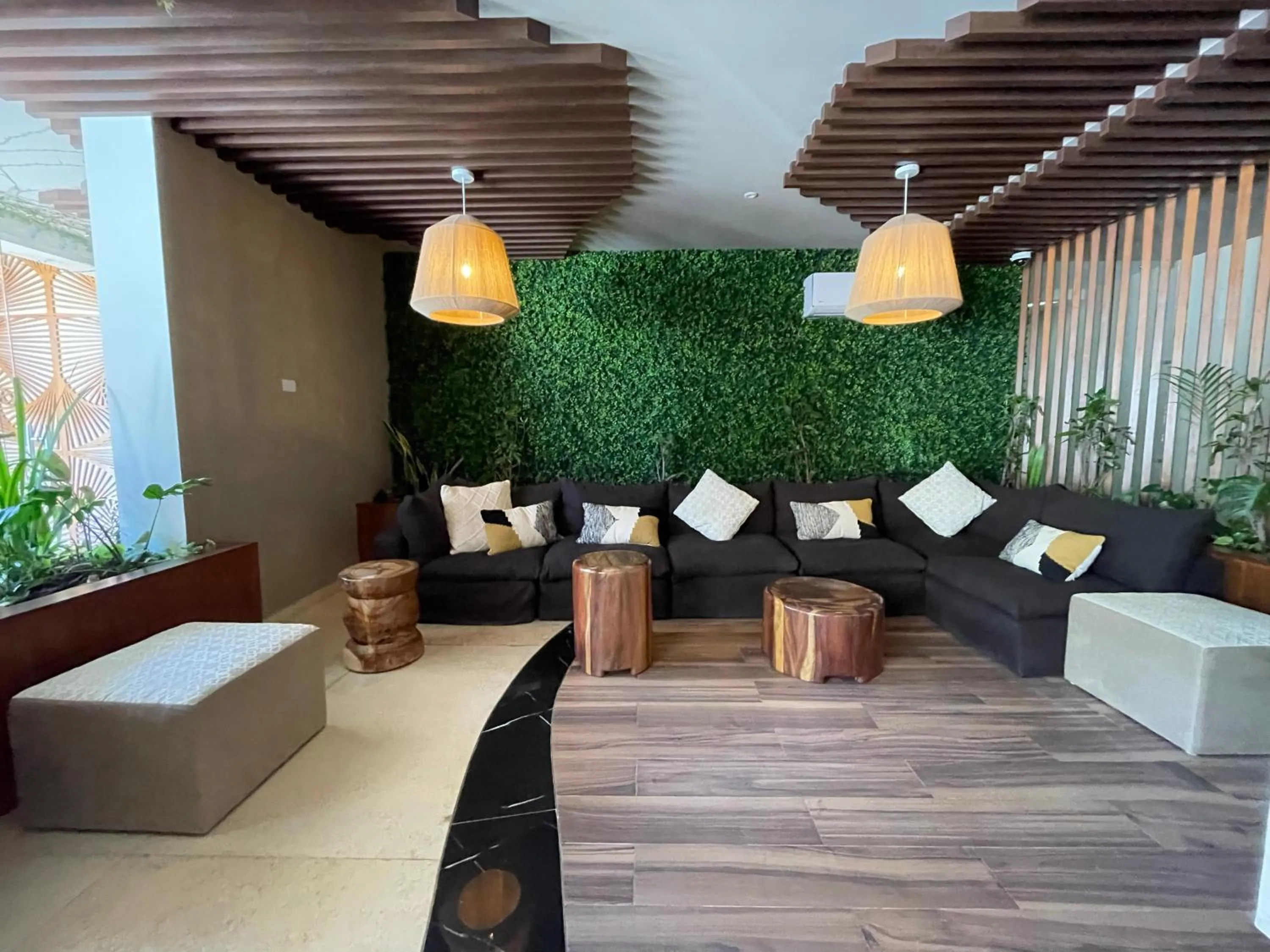 Seating area in Luxurious Studio in Menesse Tulum Pool Gym Cinema By Yeah