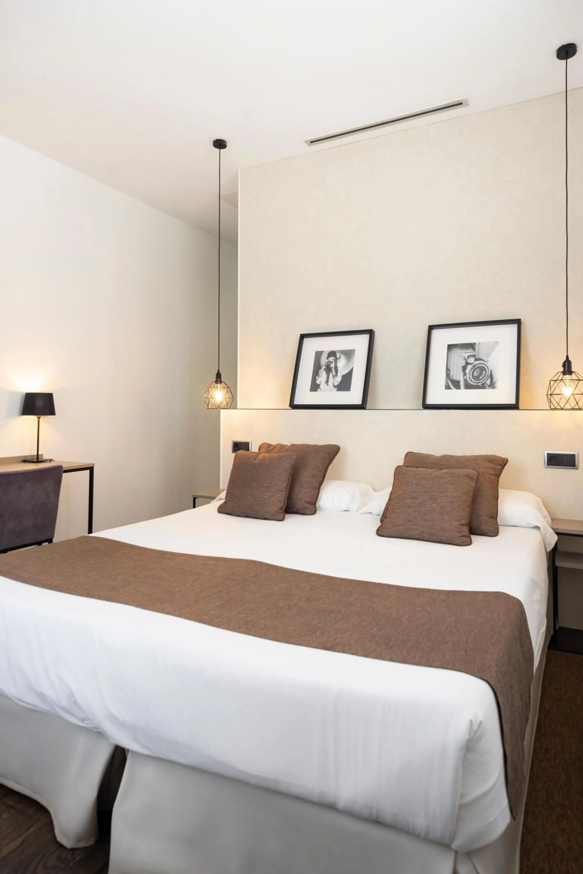 Bed in Blanq Carmen Hotel