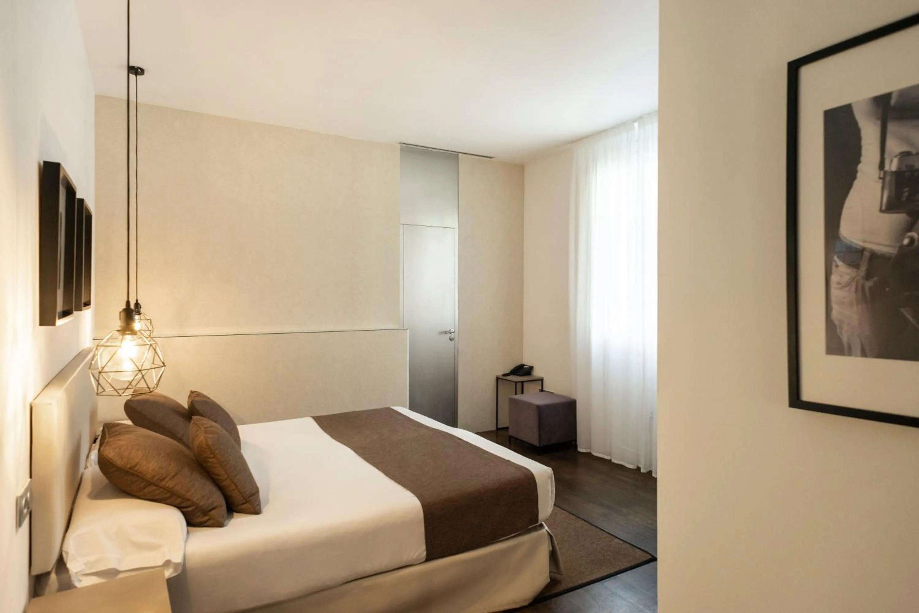 Bed in Blanq Carmen Hotel