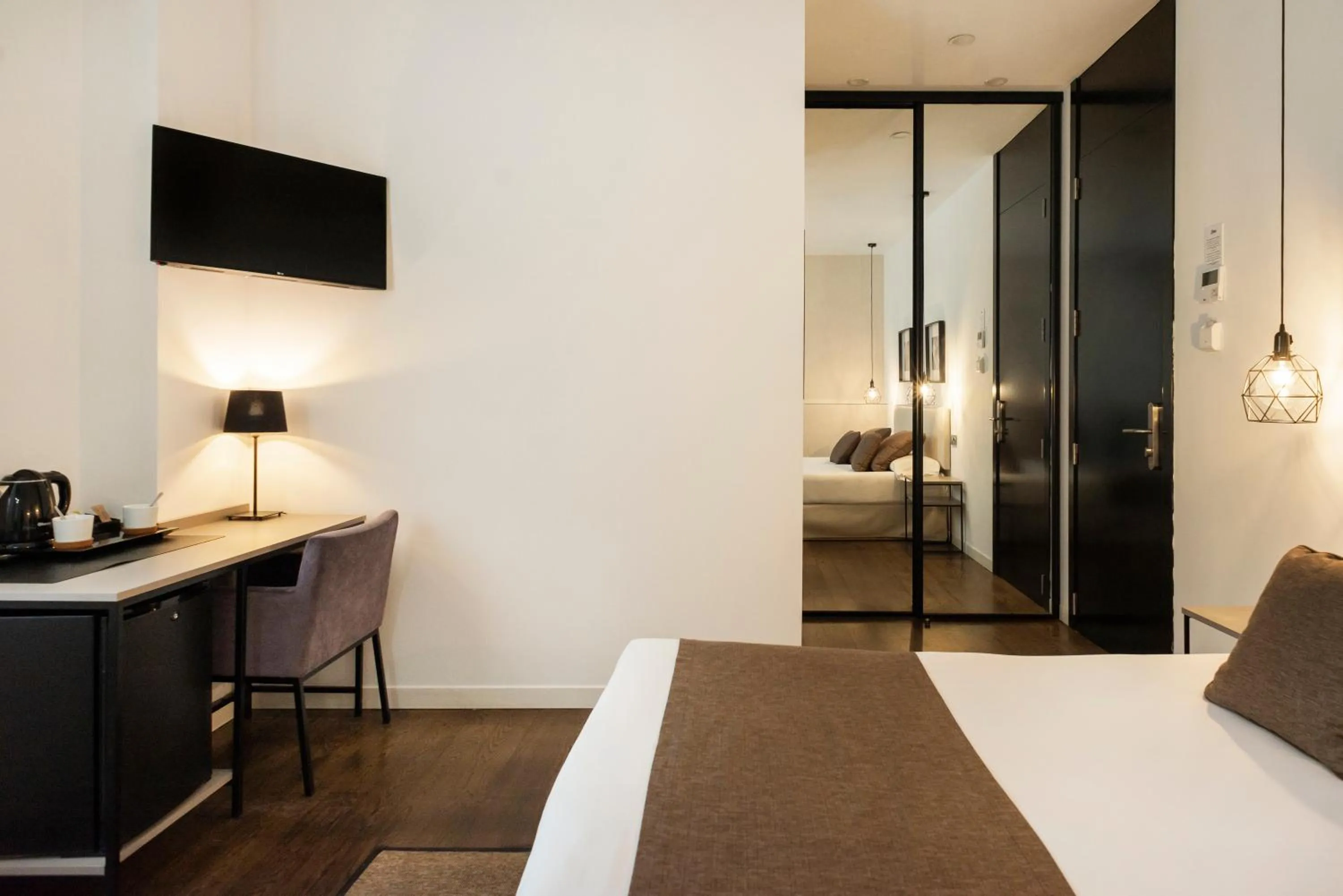 Bed in Blanq Carmen Hotel