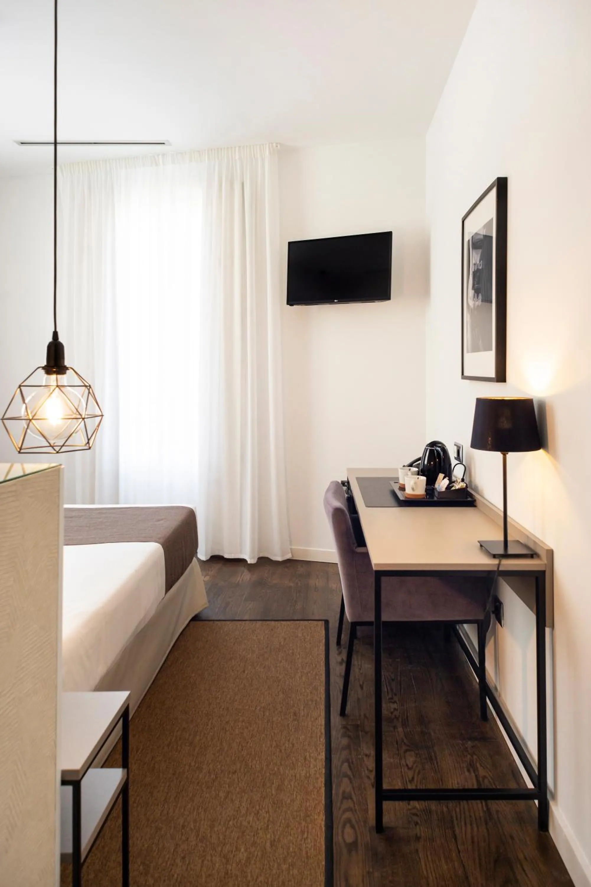 Bed in Blanq Carmen Hotel