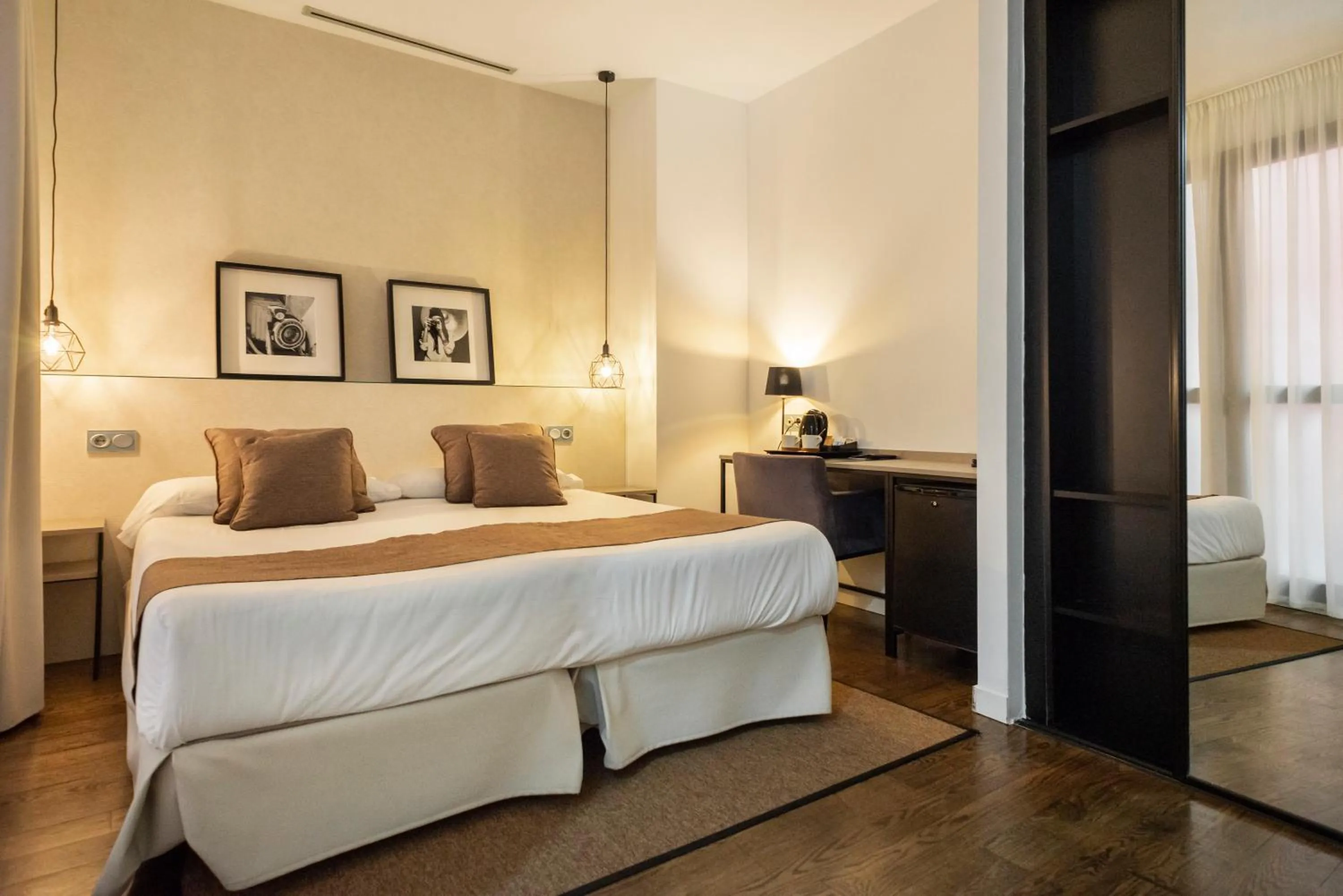 Bed in Blanq Carmen Hotel