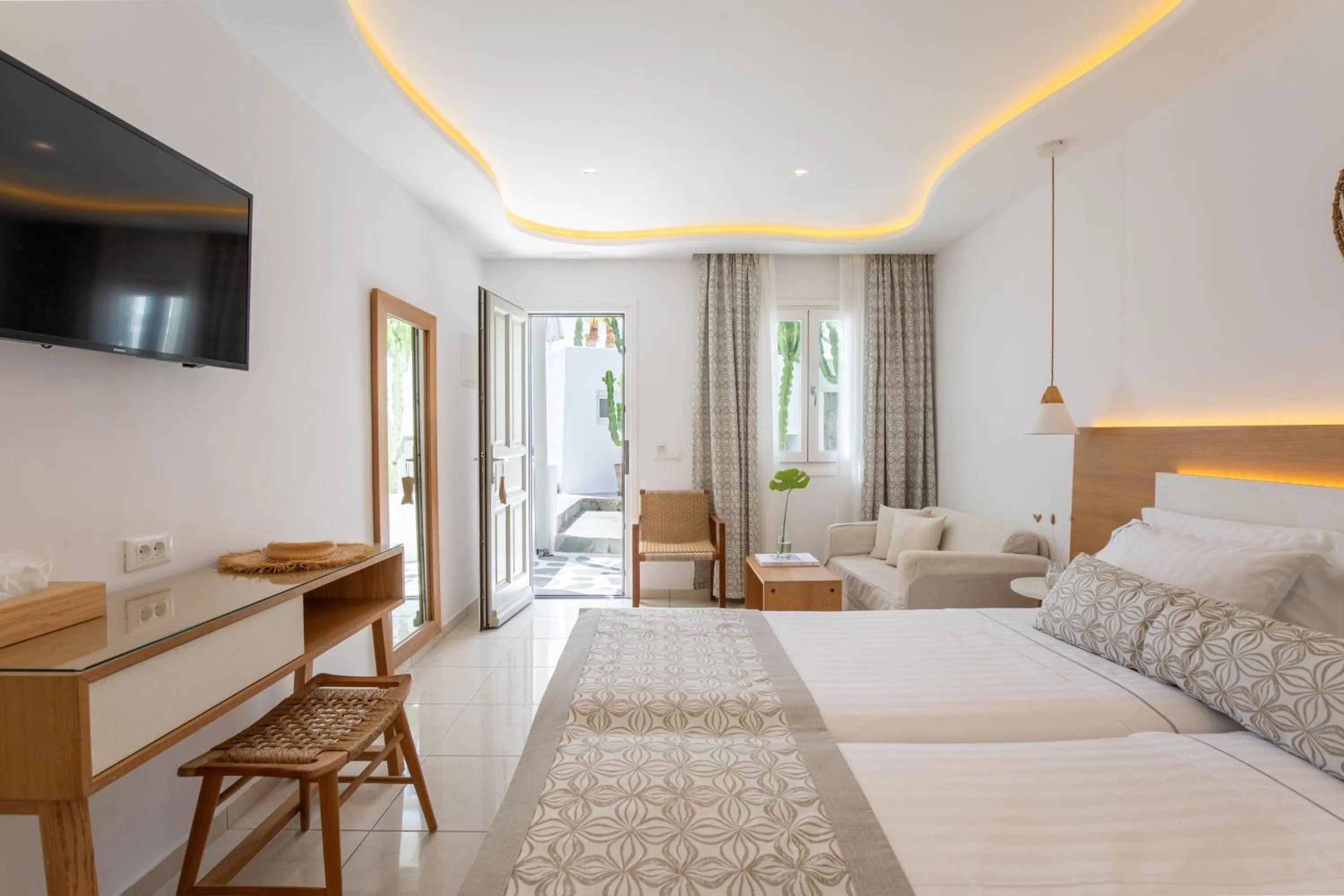 Bed in Damianos Mykonos Hotel