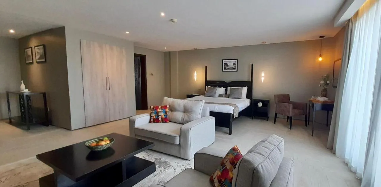 Living room, Bed in Meilin International Hotel