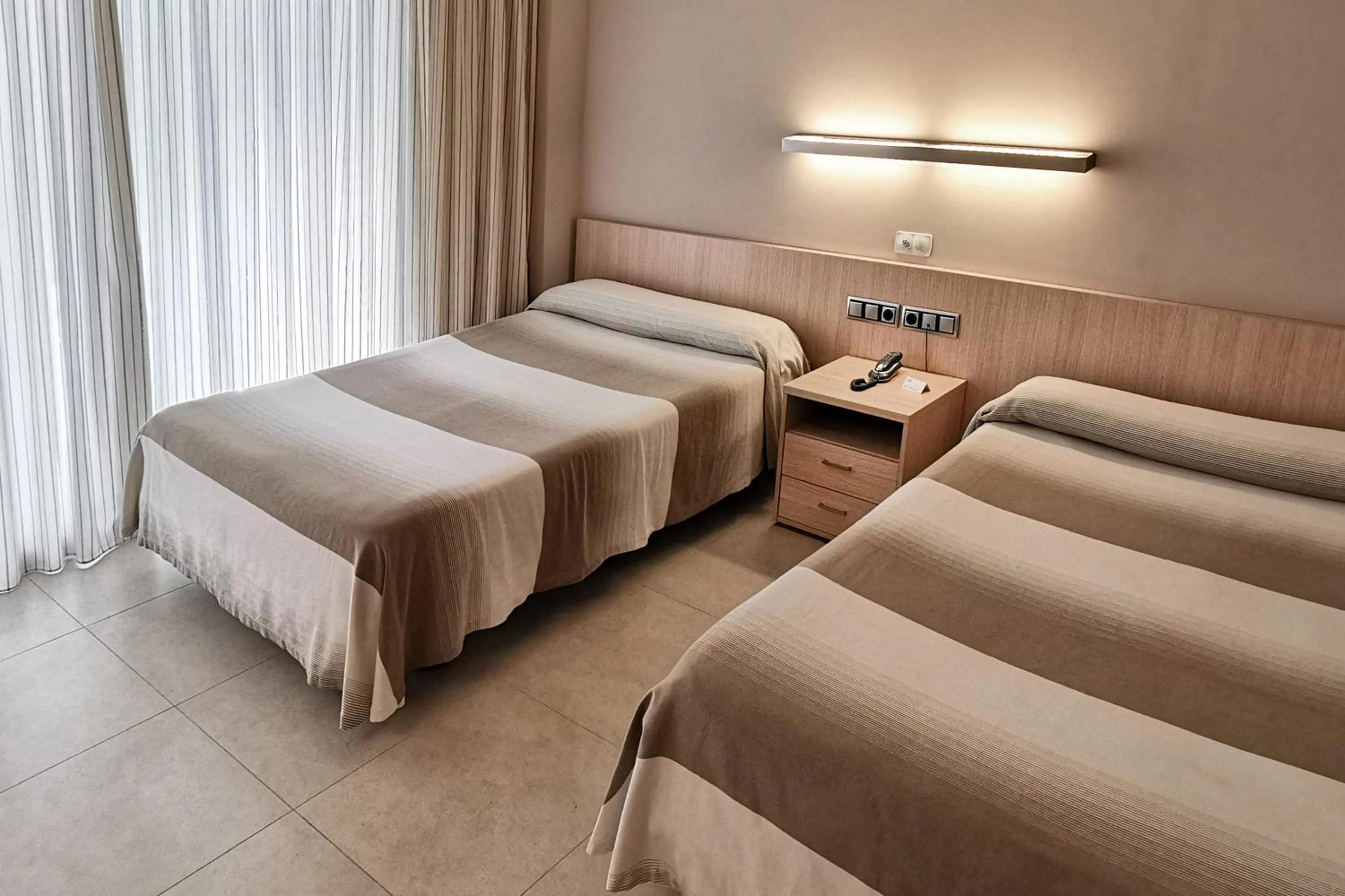 Bed in Hotel Acuazul