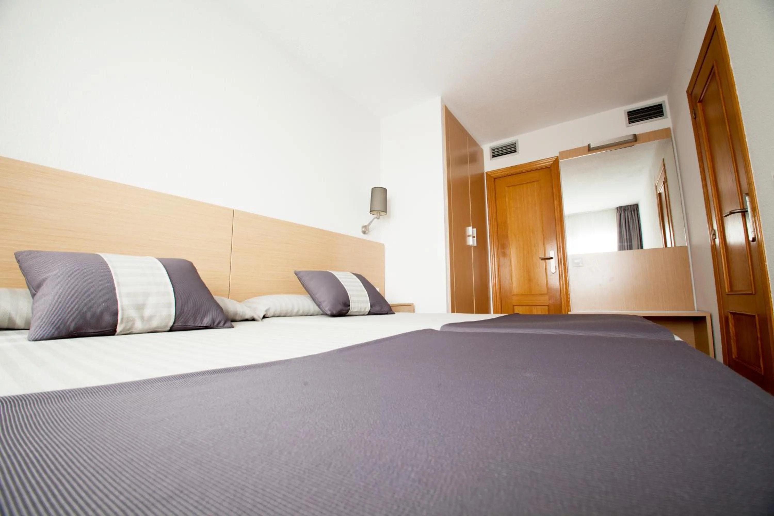 Bed in Aparthotel Acuazul