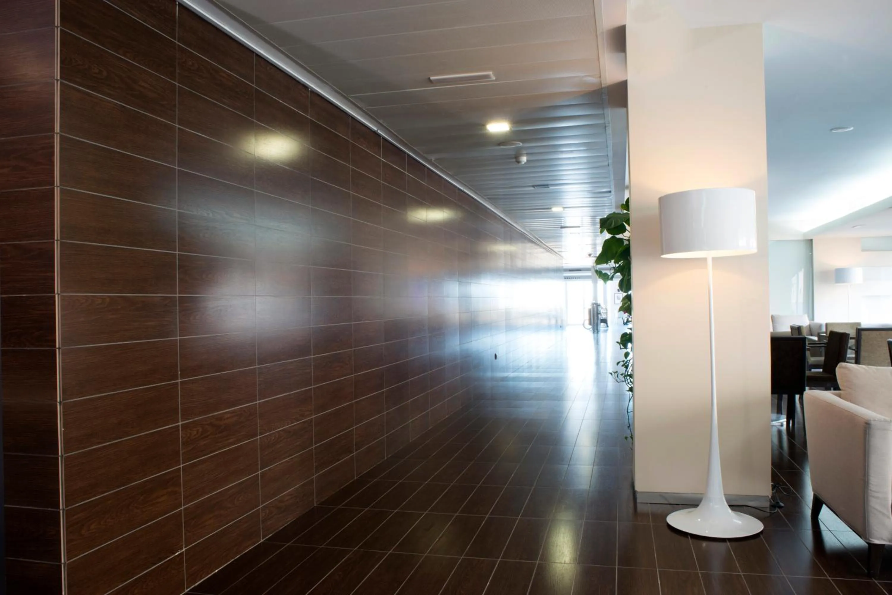 Communal lounge/ TV room in Aparthotel Acualandia