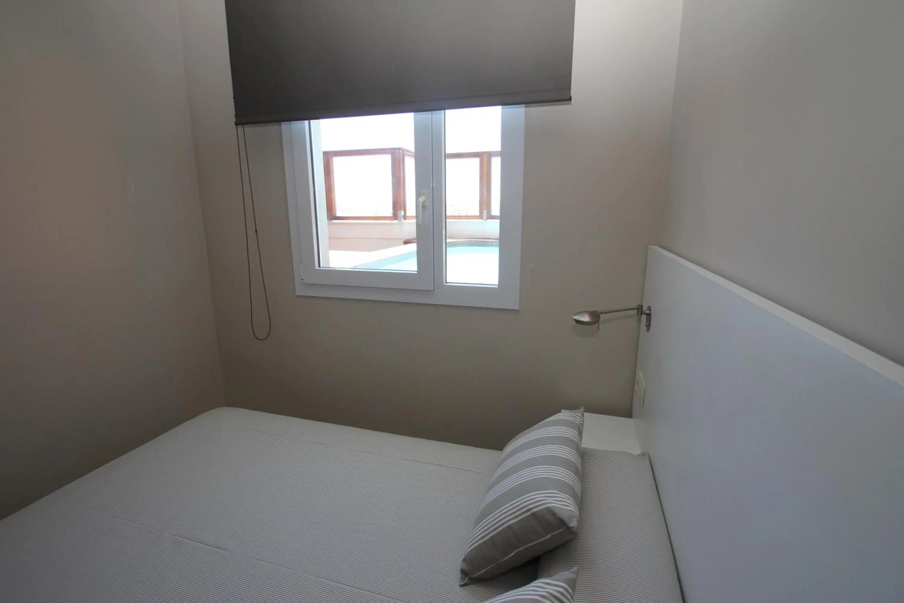 Bed in Aparthotel Acualandia