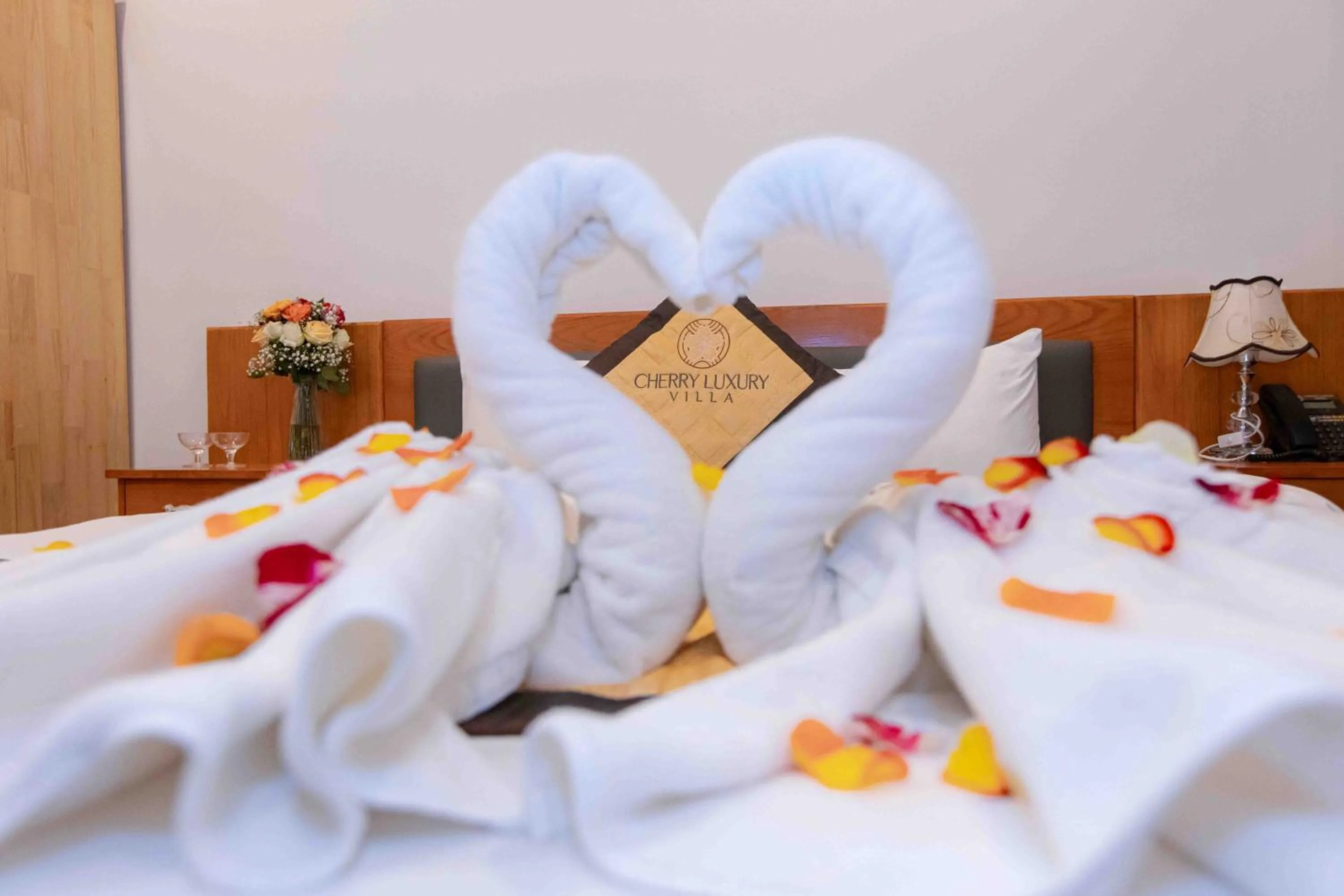 Bed in Cherry Luxury Hotel