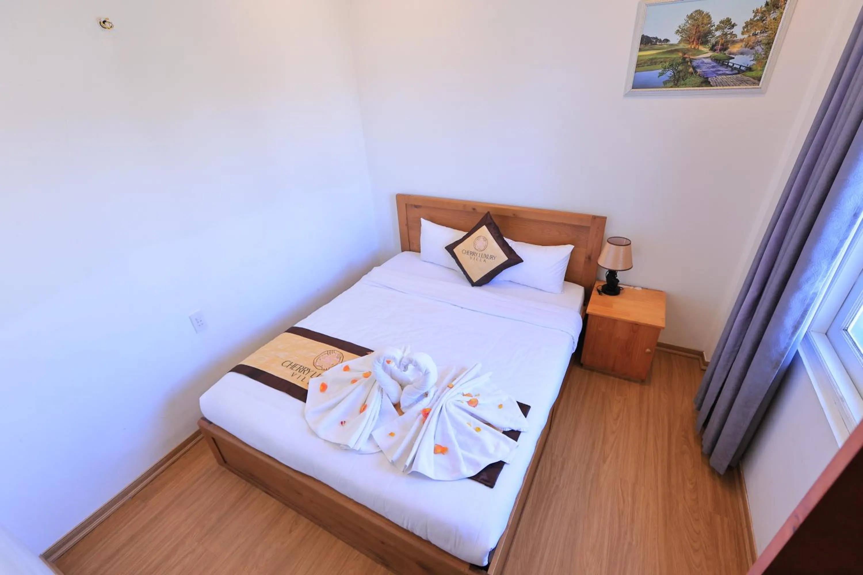 Bed in Cherry Luxury Hotel