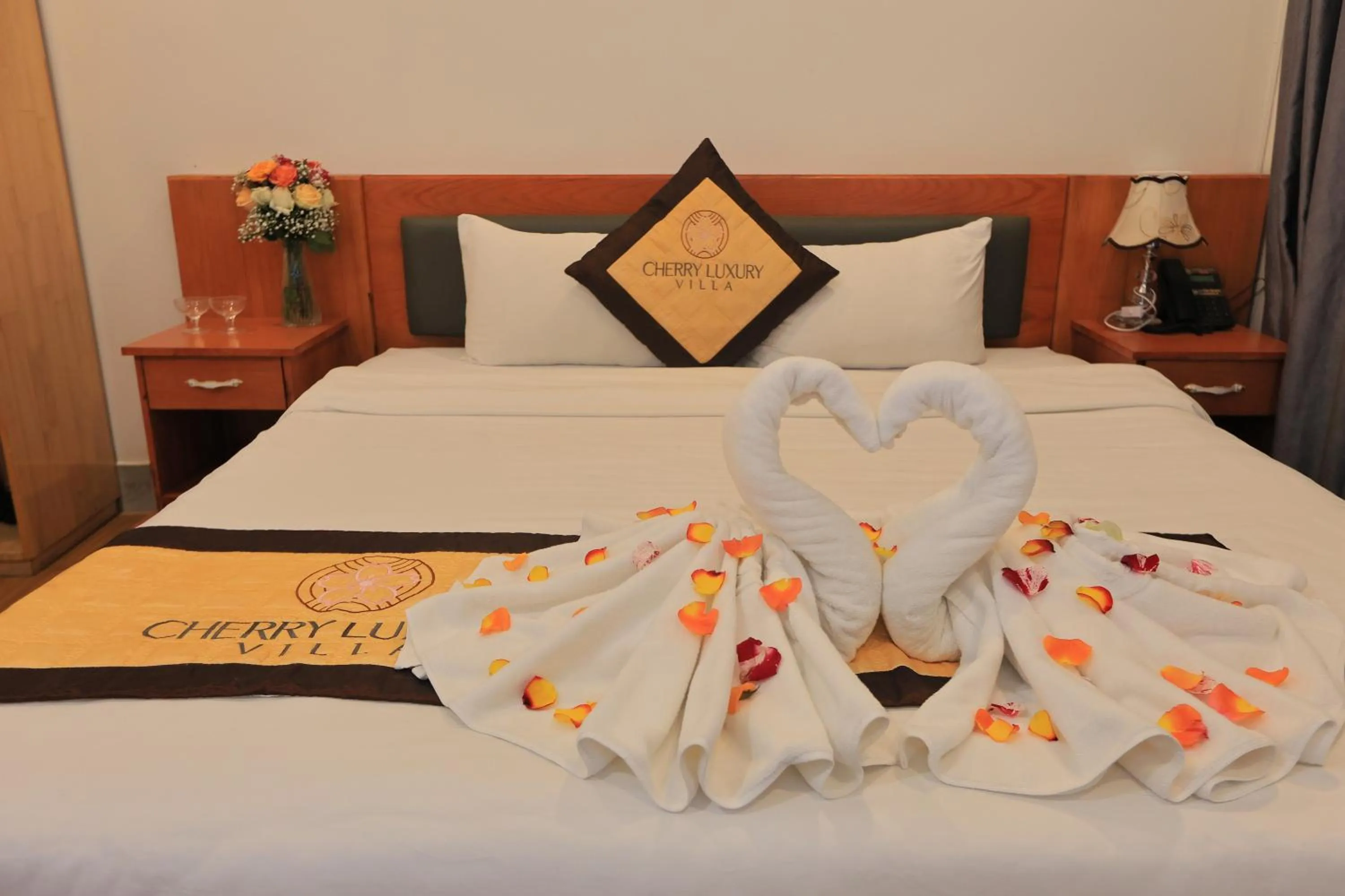 Bed in Cherry Luxury Hotel