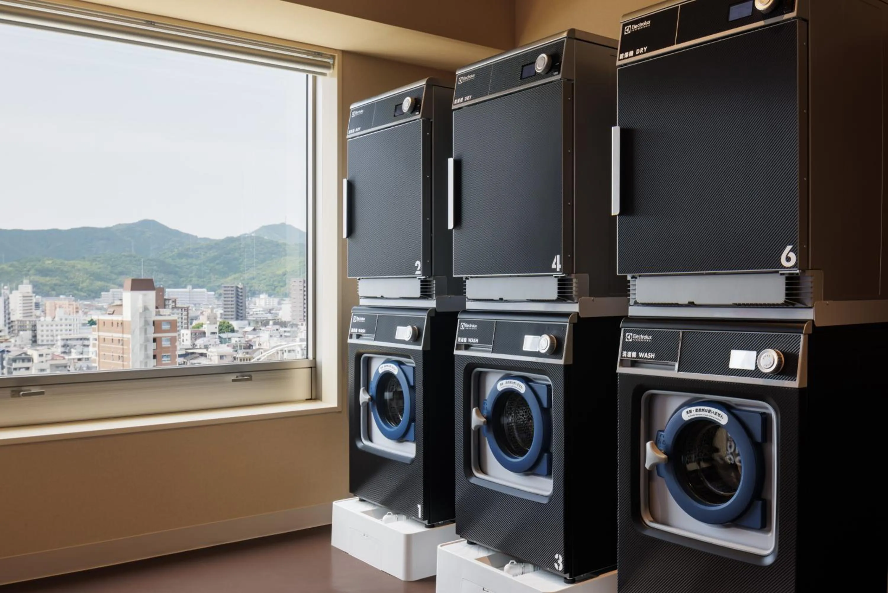 washing machine in OMO7 Kochi by Hoshino Resorts