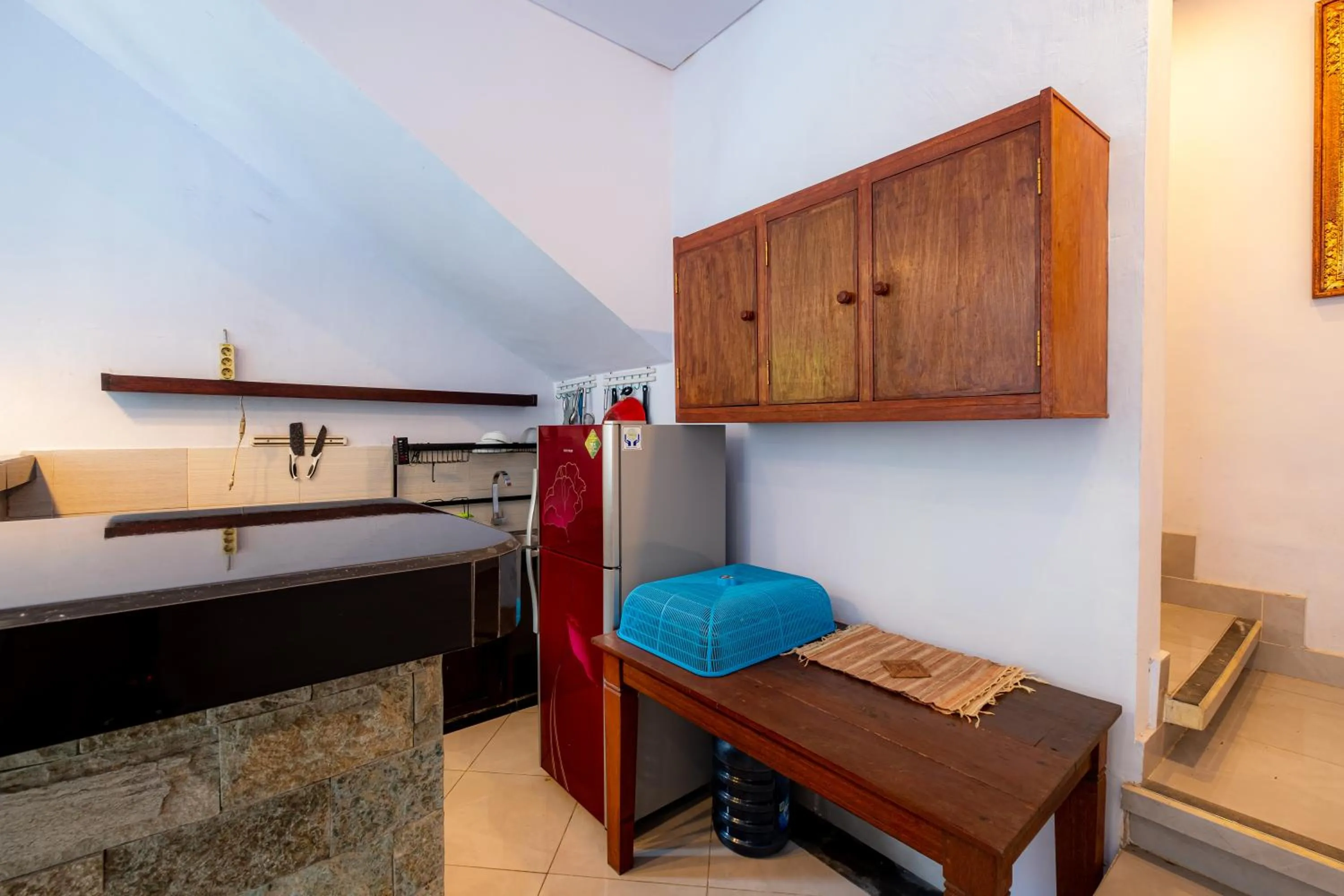 Kitchen or kitchenette in Villa Kubu Arya by Supala