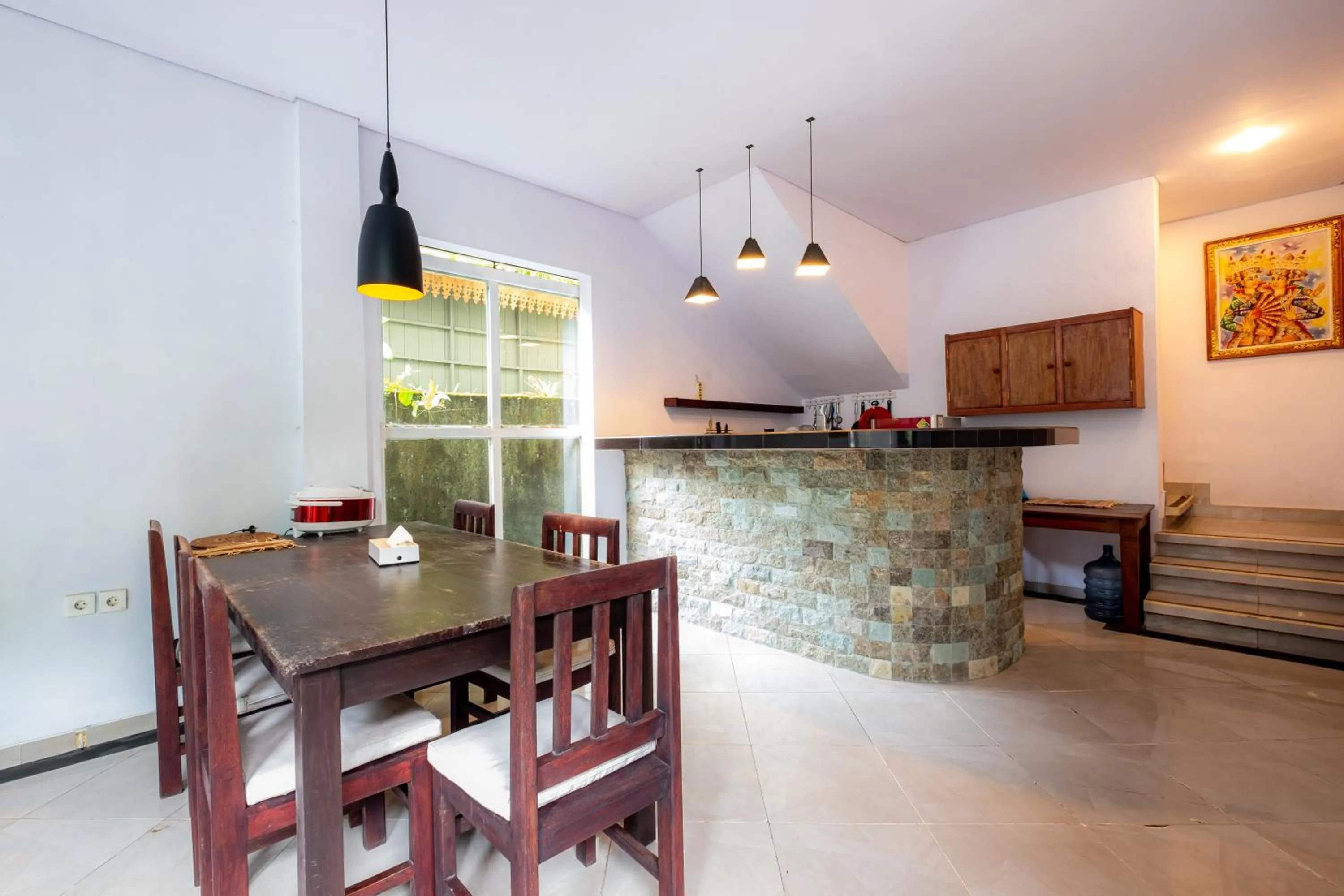 Kitchen or kitchenette in Villa Kubu Arya by Supala