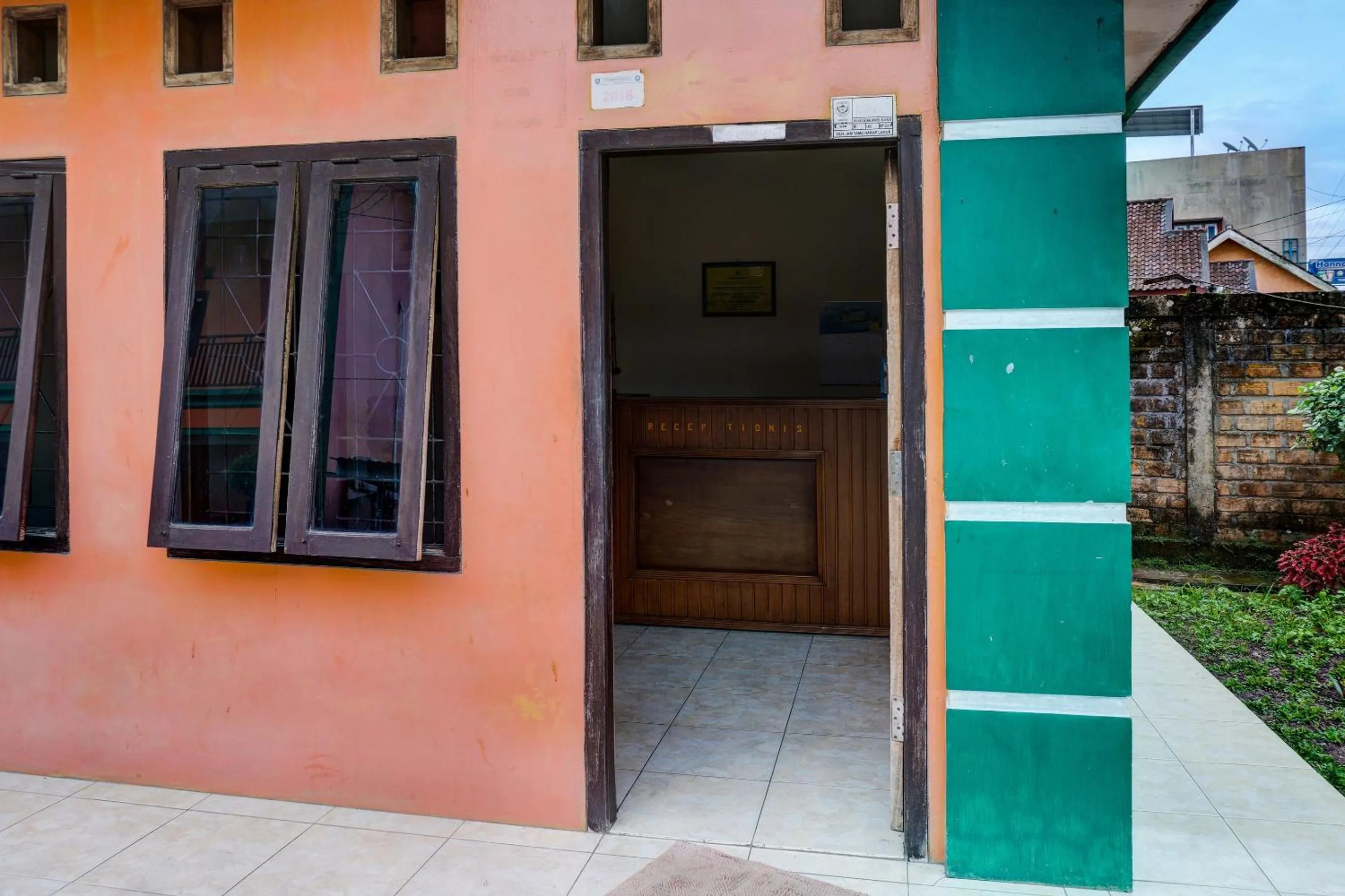 Facade/entrance in Capital O 92316 Wisma Widya Loka Pratama Near Futsal Tebing Gading