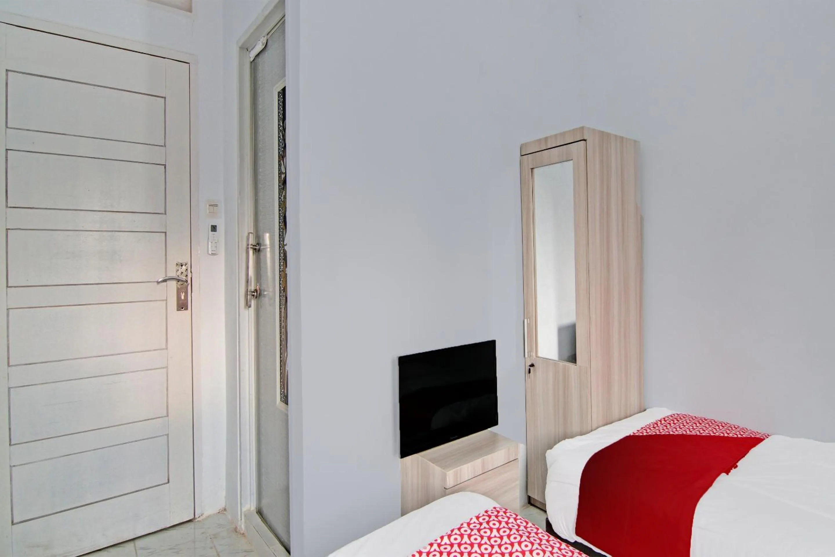 Bedroom in Hotel O Melati Residence Syariah