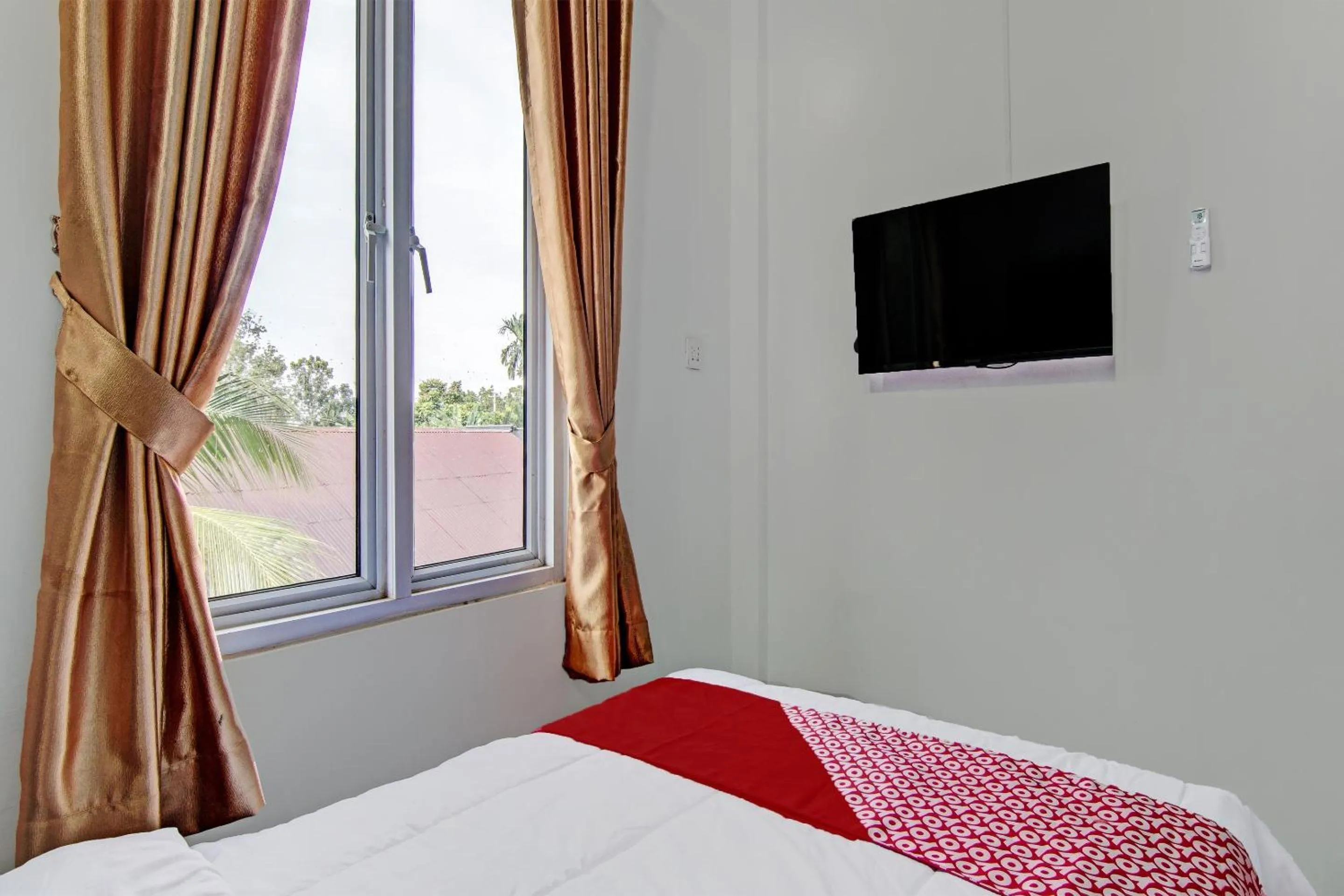 Bedroom in Hotel O Melati Residence Syariah