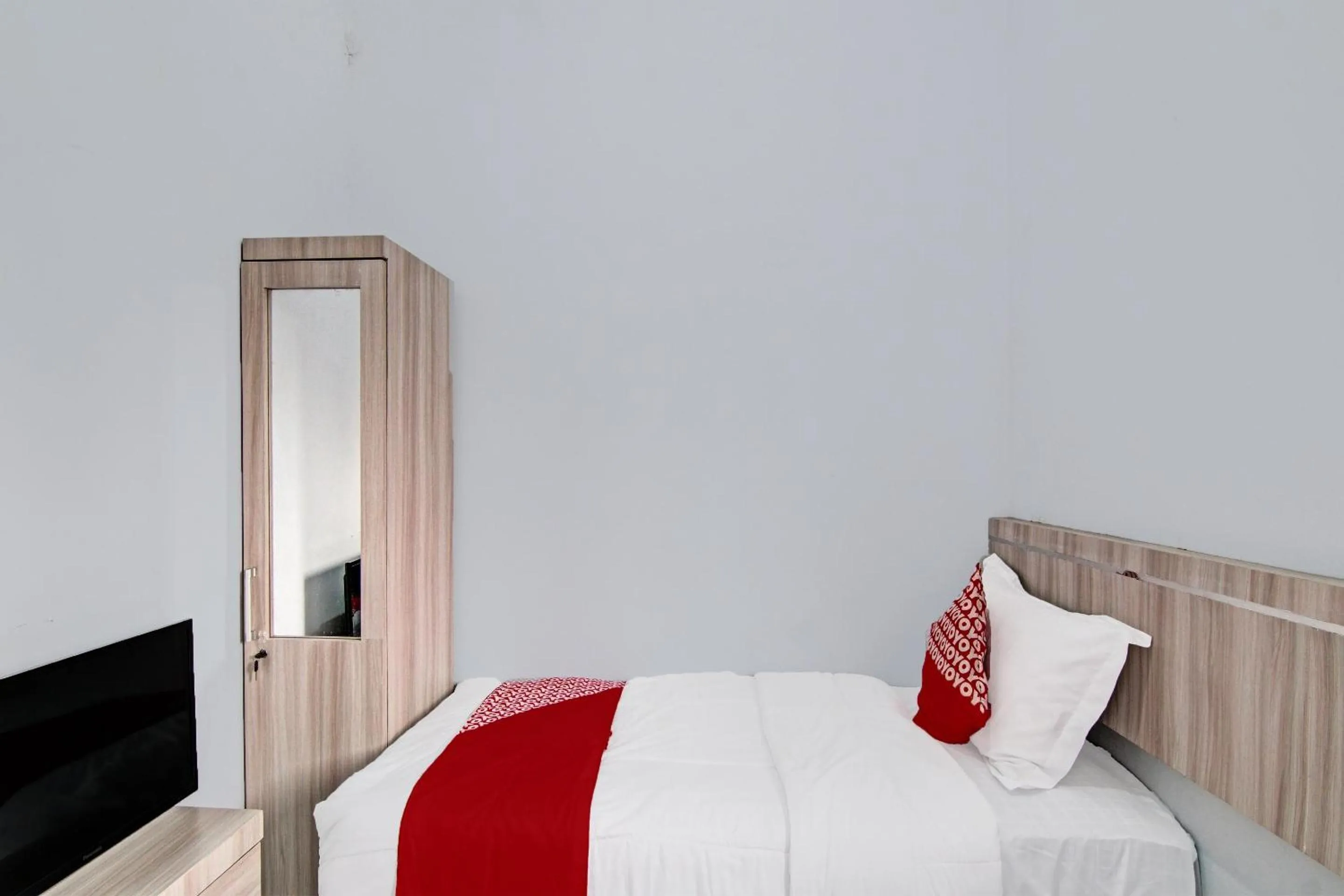 Bedroom in Hotel O Melati Residence Syariah