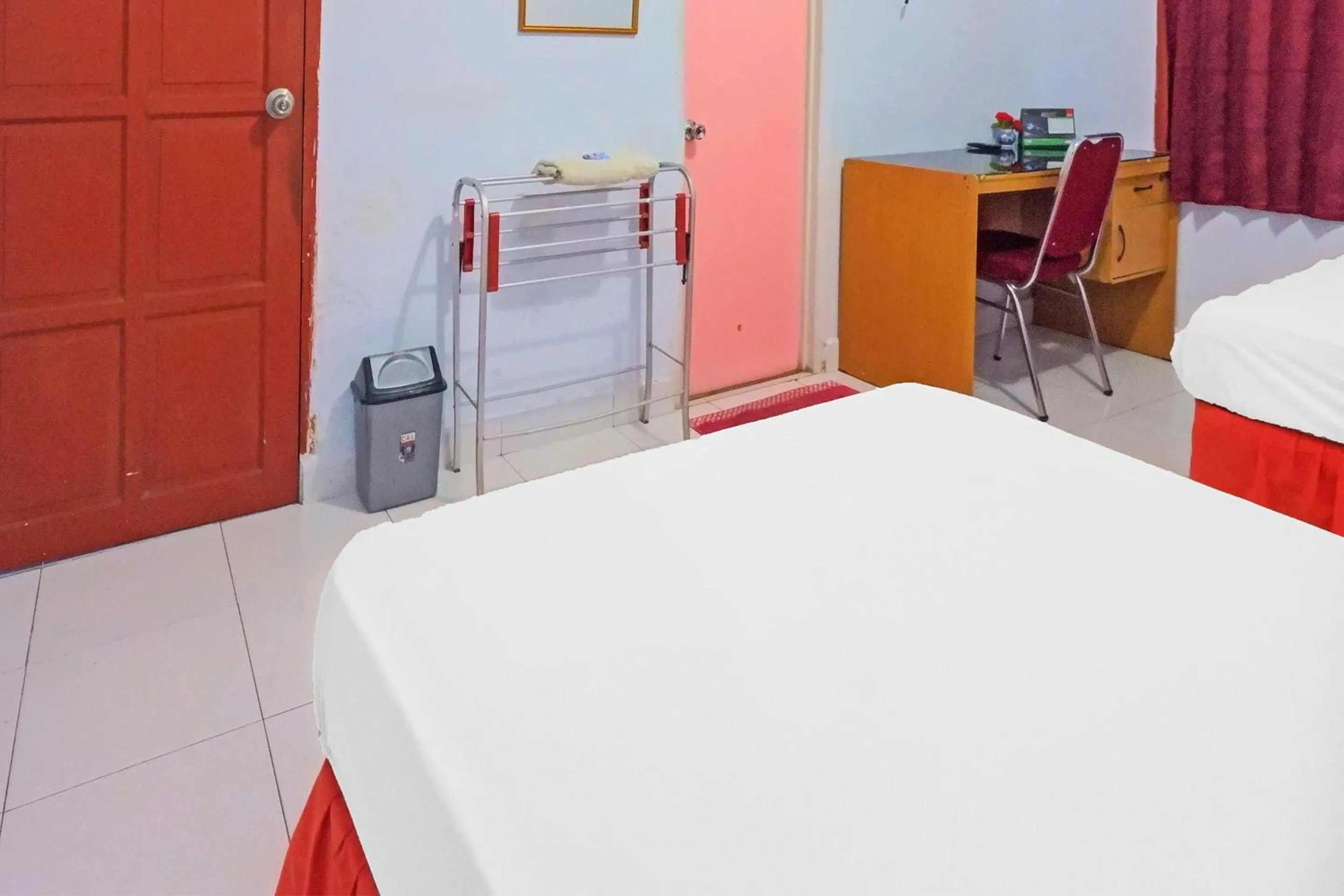 Bedroom in Hotel O Wisma Arwini Syariah Near Benteng Balangnipa