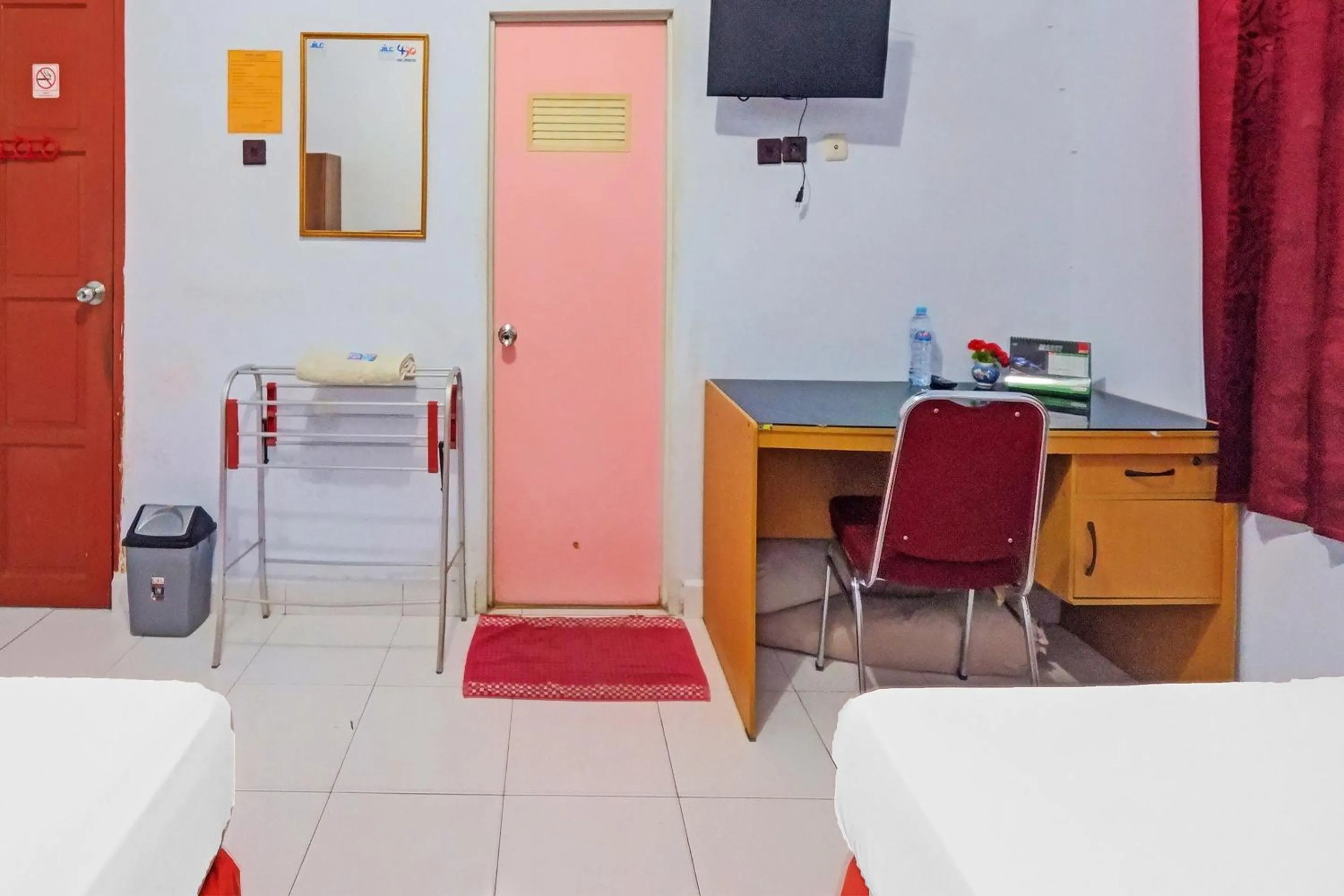 Bedroom in Hotel O Wisma Arwini Syariah Near Benteng Balangnipa