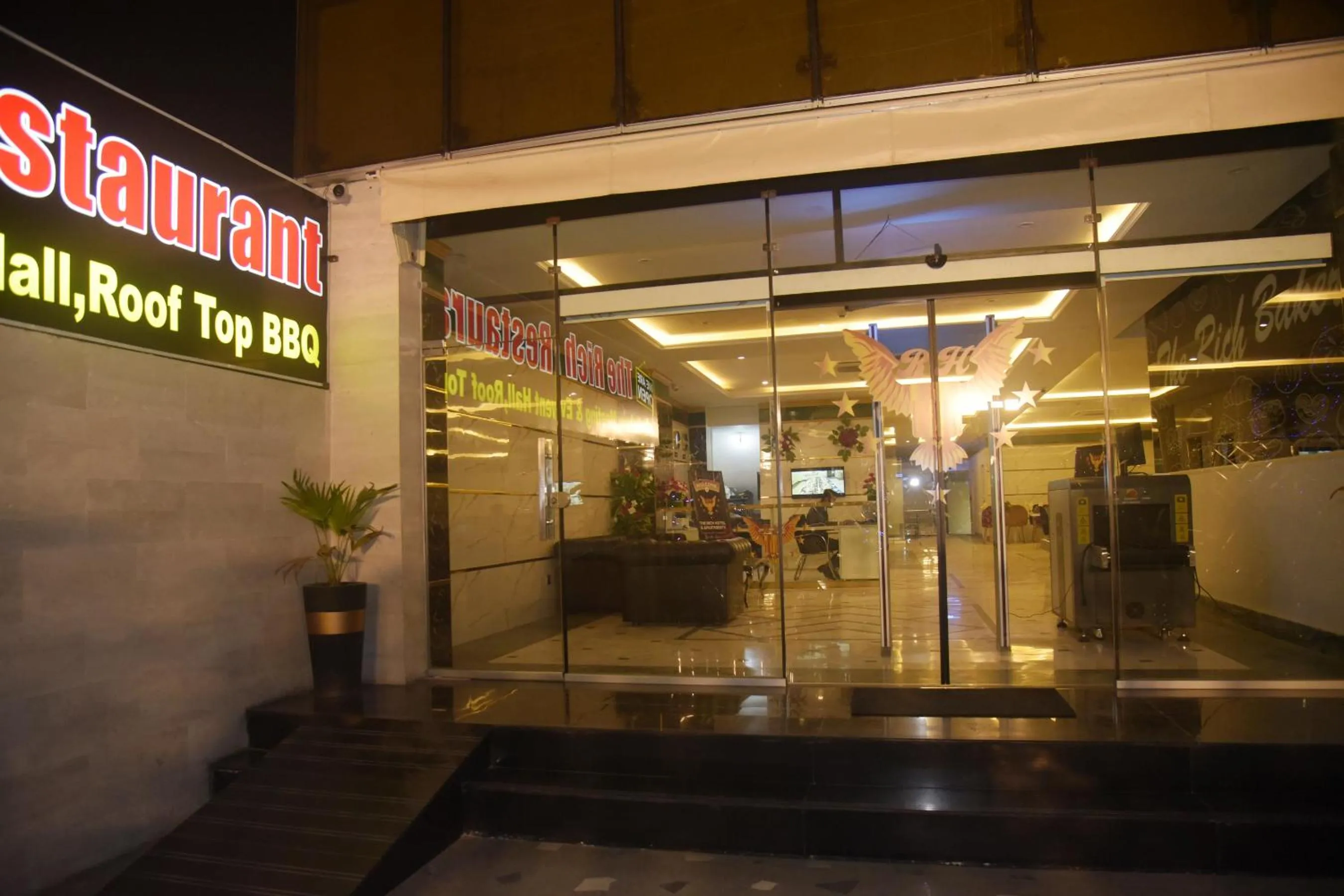 Property building in The Rich Hotel & Apartments