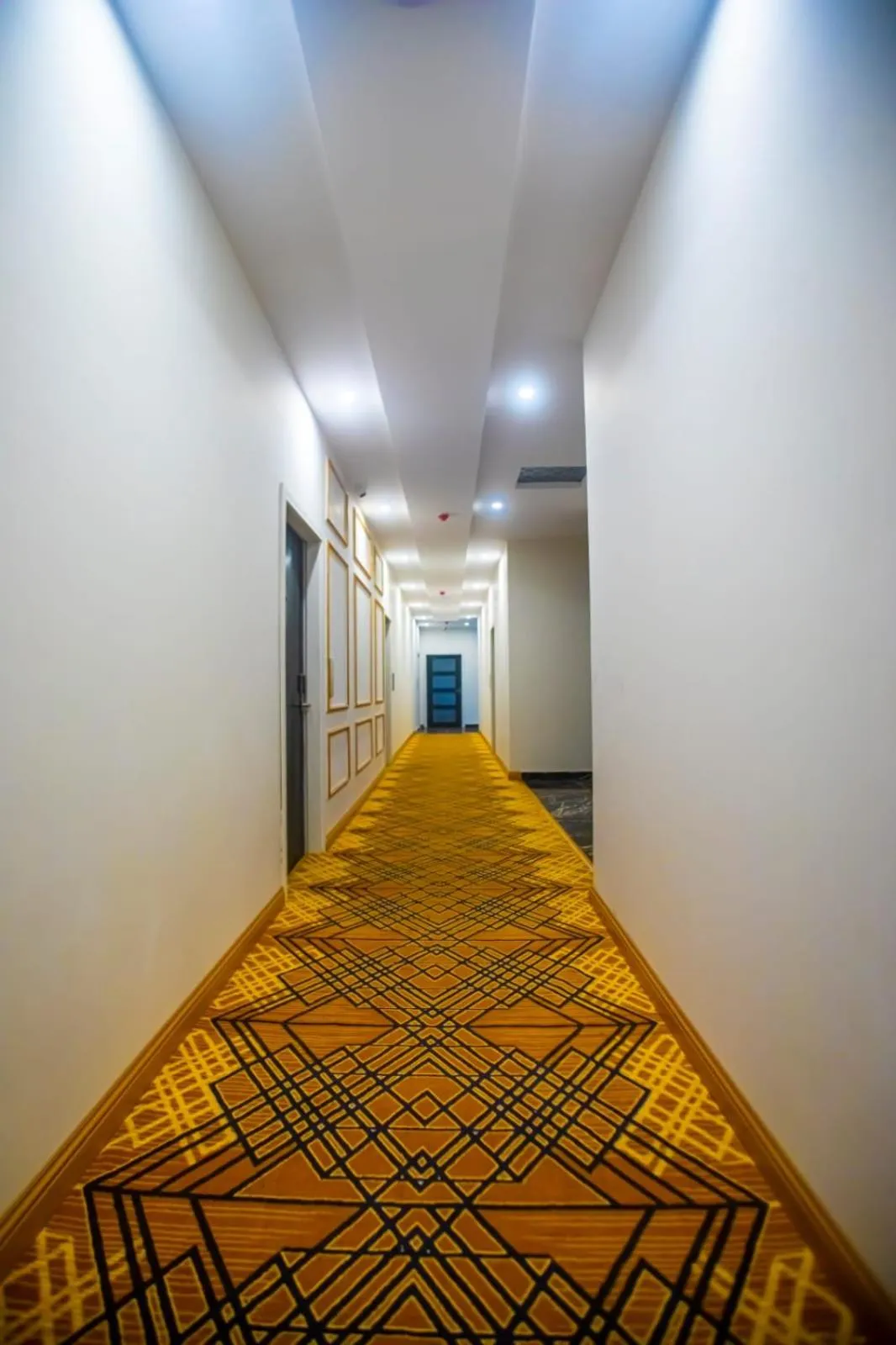 Property building in The Rich Hotel & Apartments