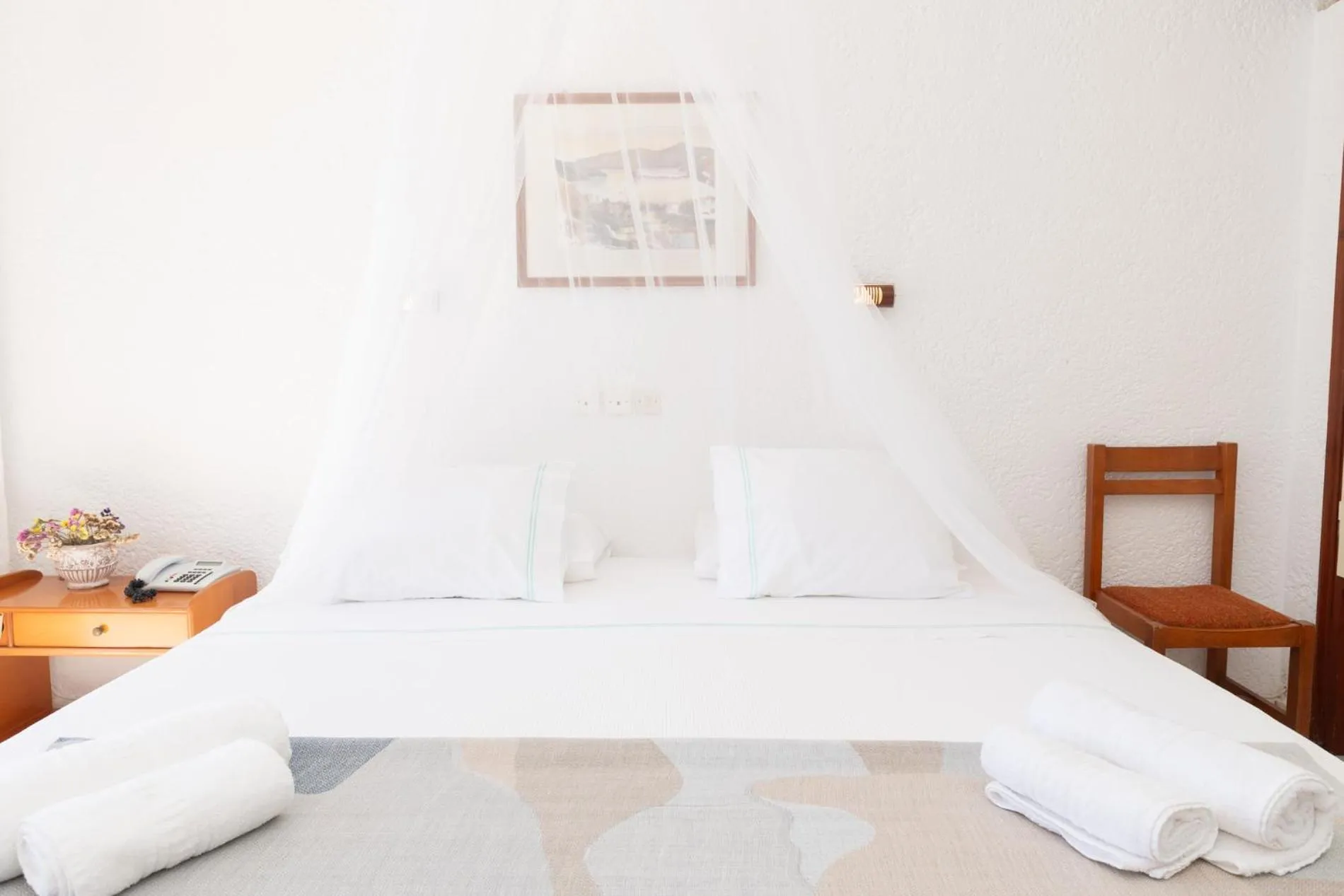 Bed in Golden Sun Hotel Patmos