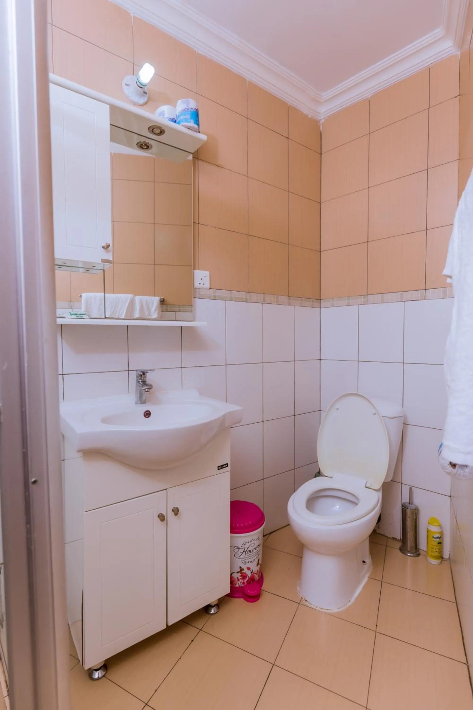 Toilet in KAMI LUXURY APARTMENTS