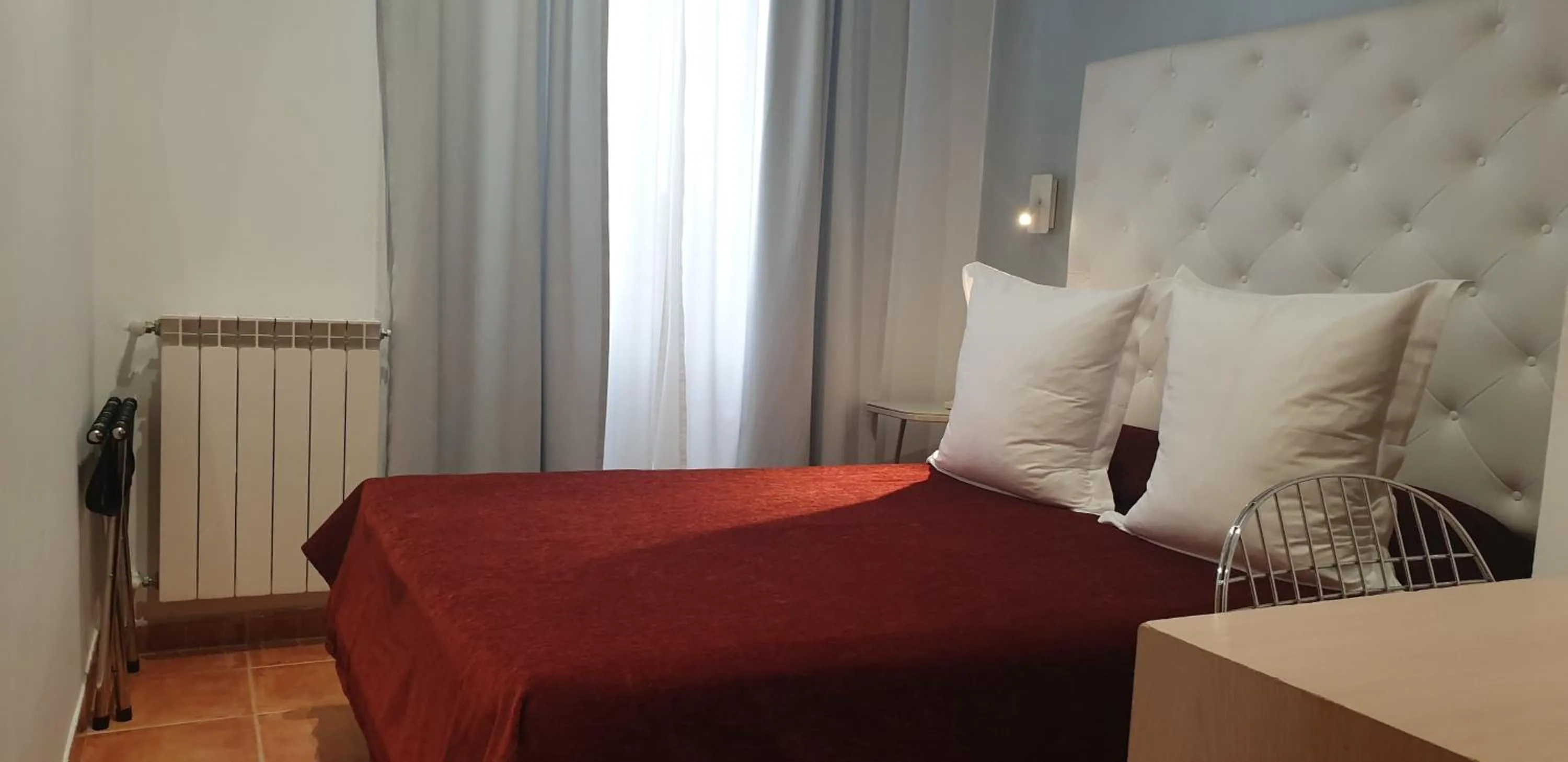 Photo of the whole room, Bed in Hostal Las Fuentes