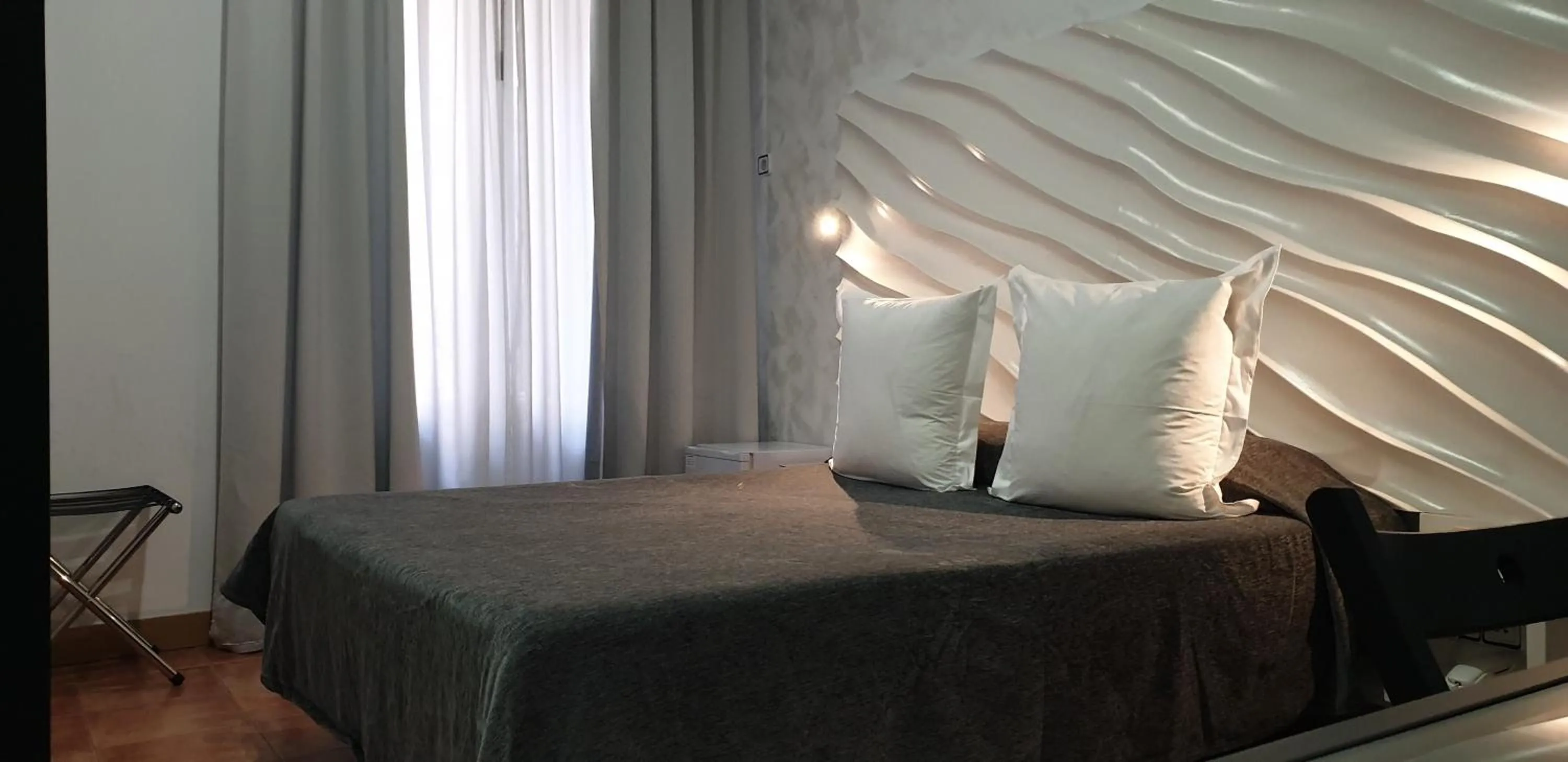 Photo of the whole room, Bed in Hostal Las Fuentes