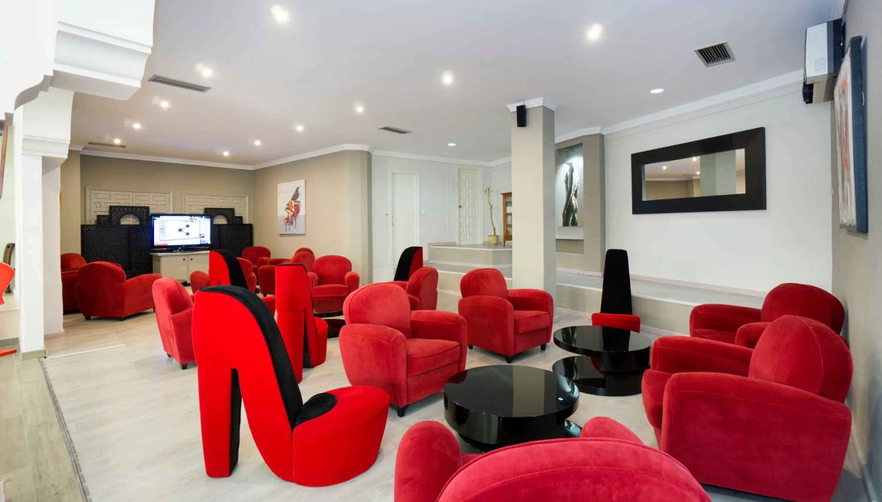 Communal lounge/ TV room in Hotel El Pozo