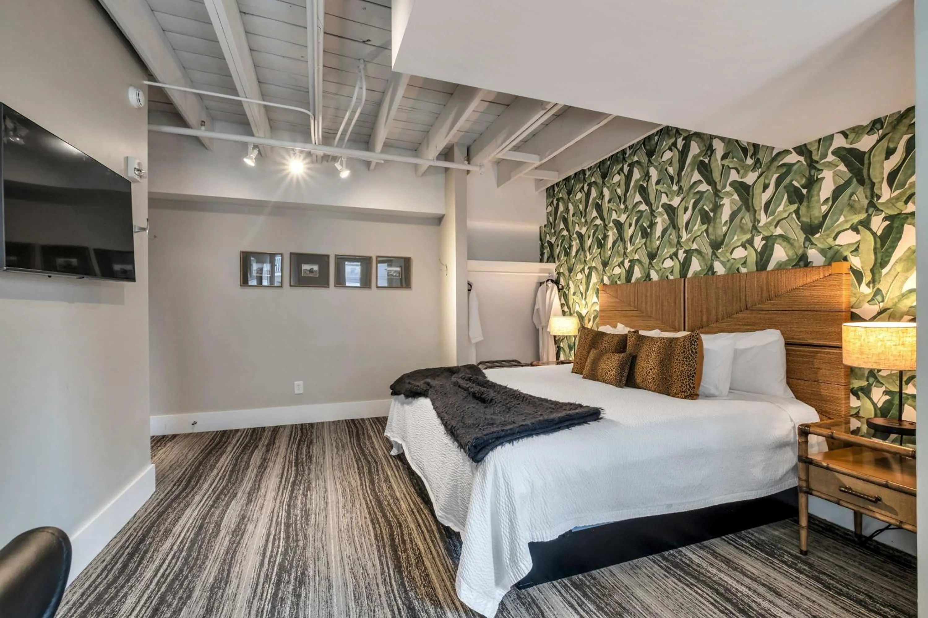 Bed in Skyline Suite with Penthouse & Rooftop Deck 6BR by Maddox Hotel