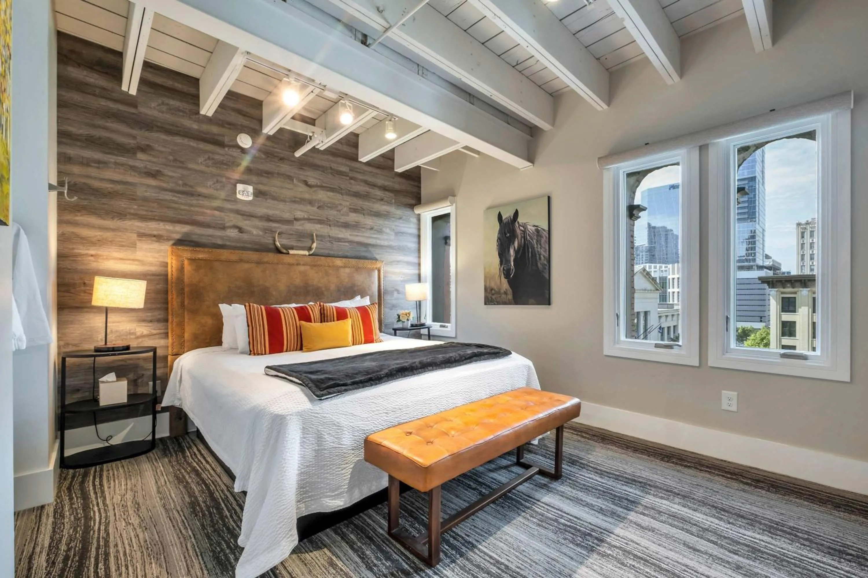 Bed in Skyline Suite with Penthouse & Rooftop Deck 6BR by Maddox Hotel
