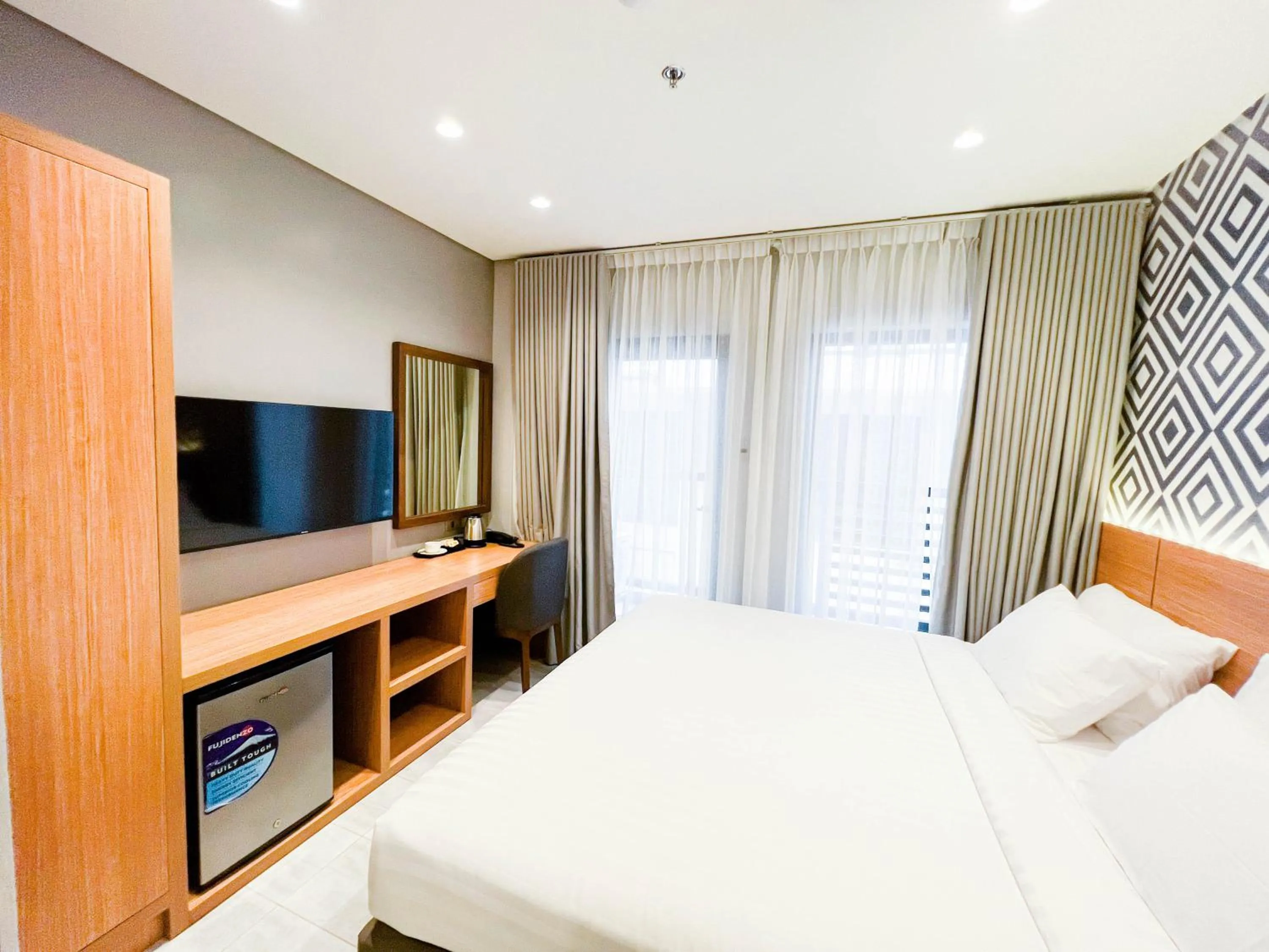 Photo of the whole room, Bed in The Manaoag Hotel